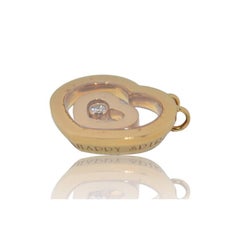 18K Yellow gold Chopard Happy Spirit pendant with diamonds