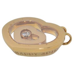 18K Yellow gold Chopard Happy Spirit pendant with diamonds