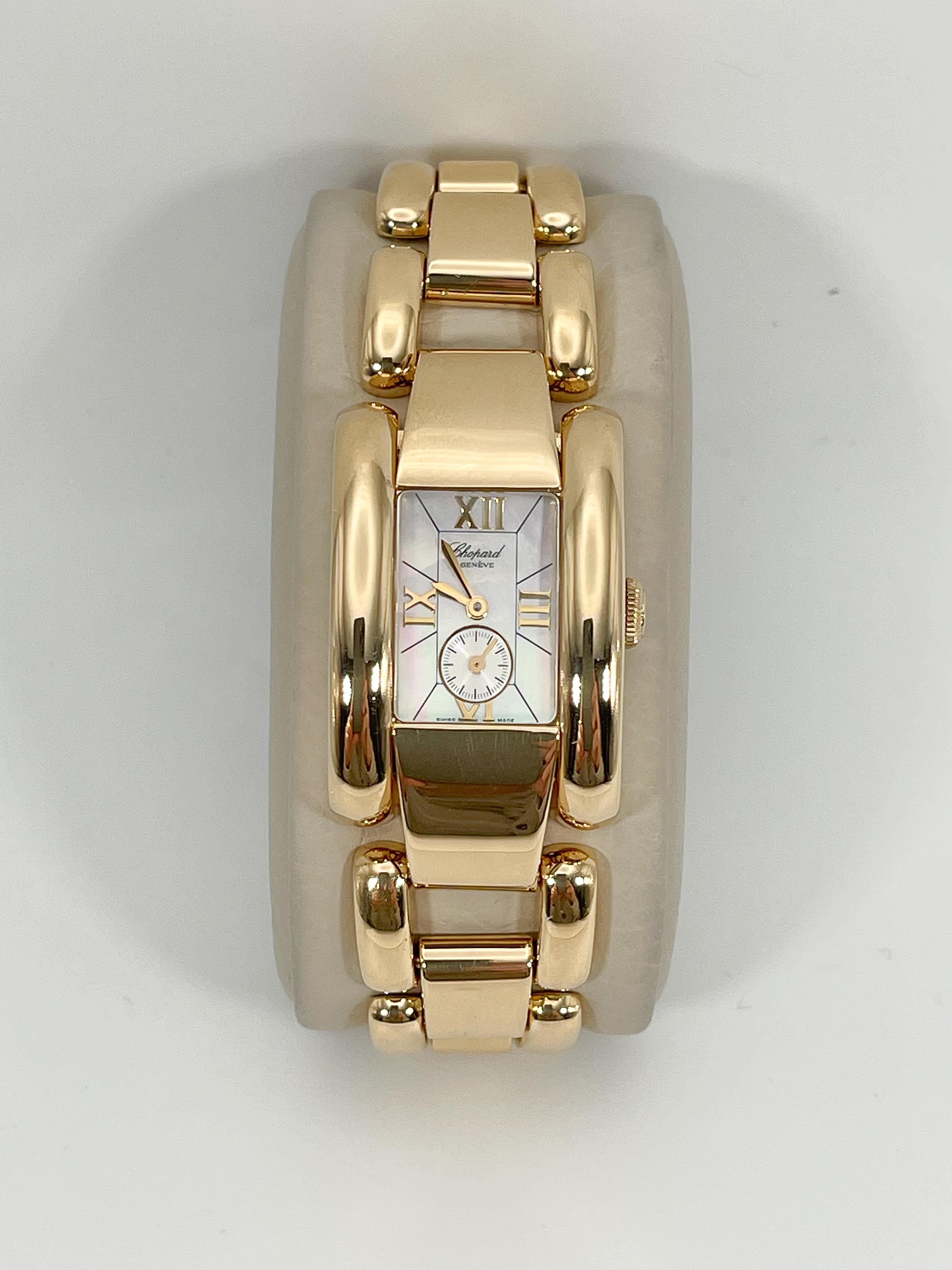 Chopard La Strada with rare mother of pearl dial. 
Ref. 41/6804
Watch is 18k yellow gold, production 2010, quartz movement, sapphire crystal, case diameter is 23mm x 34mm, roman numerals, has a total weight of 123 grams, and fits a size 6 1/2