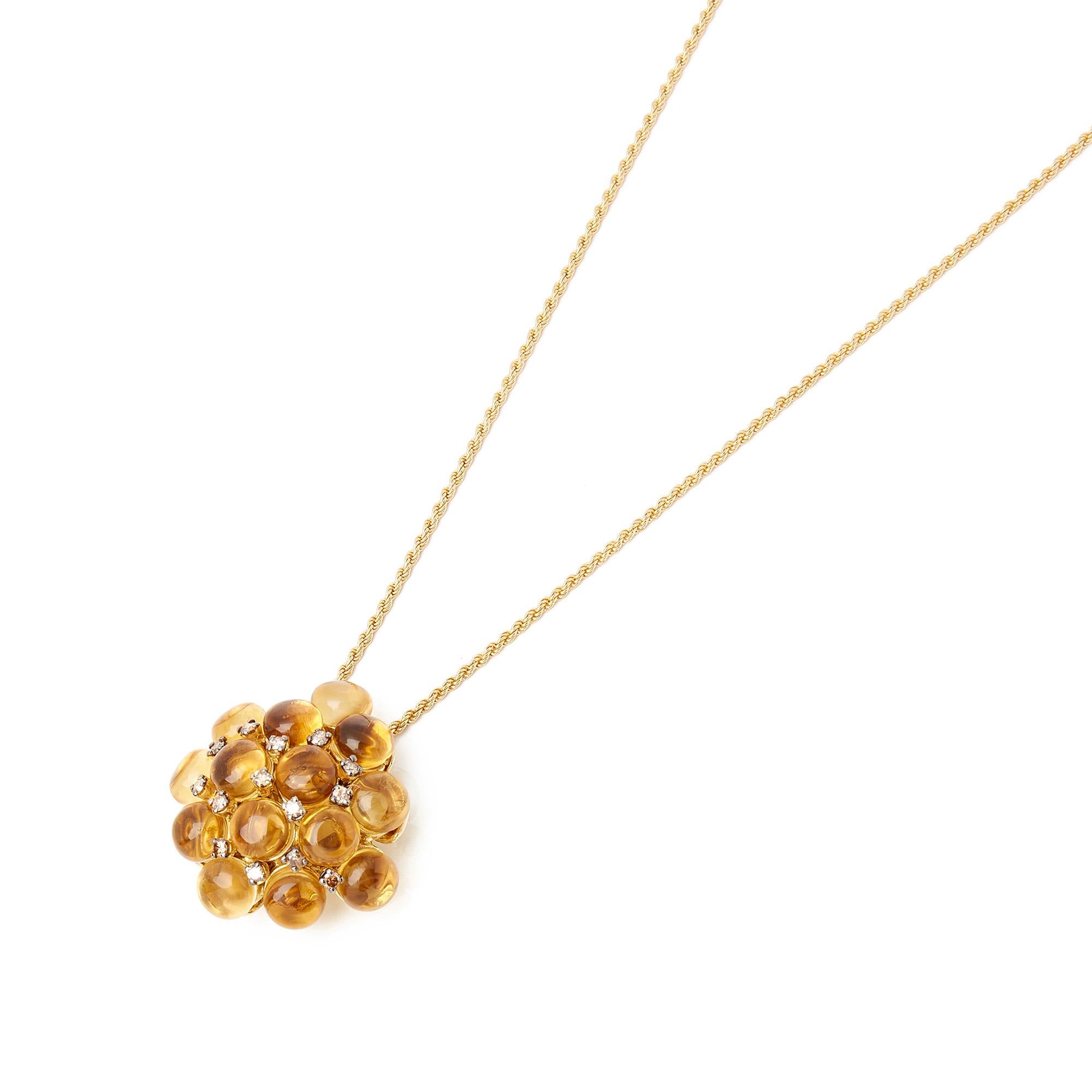 This Pendant Features Fourteen Cabochon Cut Citrines in a scattered design set with Round Brilliant Cut Diamonds Mounted in 18k Yellow Gold. Complete with Xupes Presentation Box. Our Xupes reference is COMJ213 should you need to quote this.