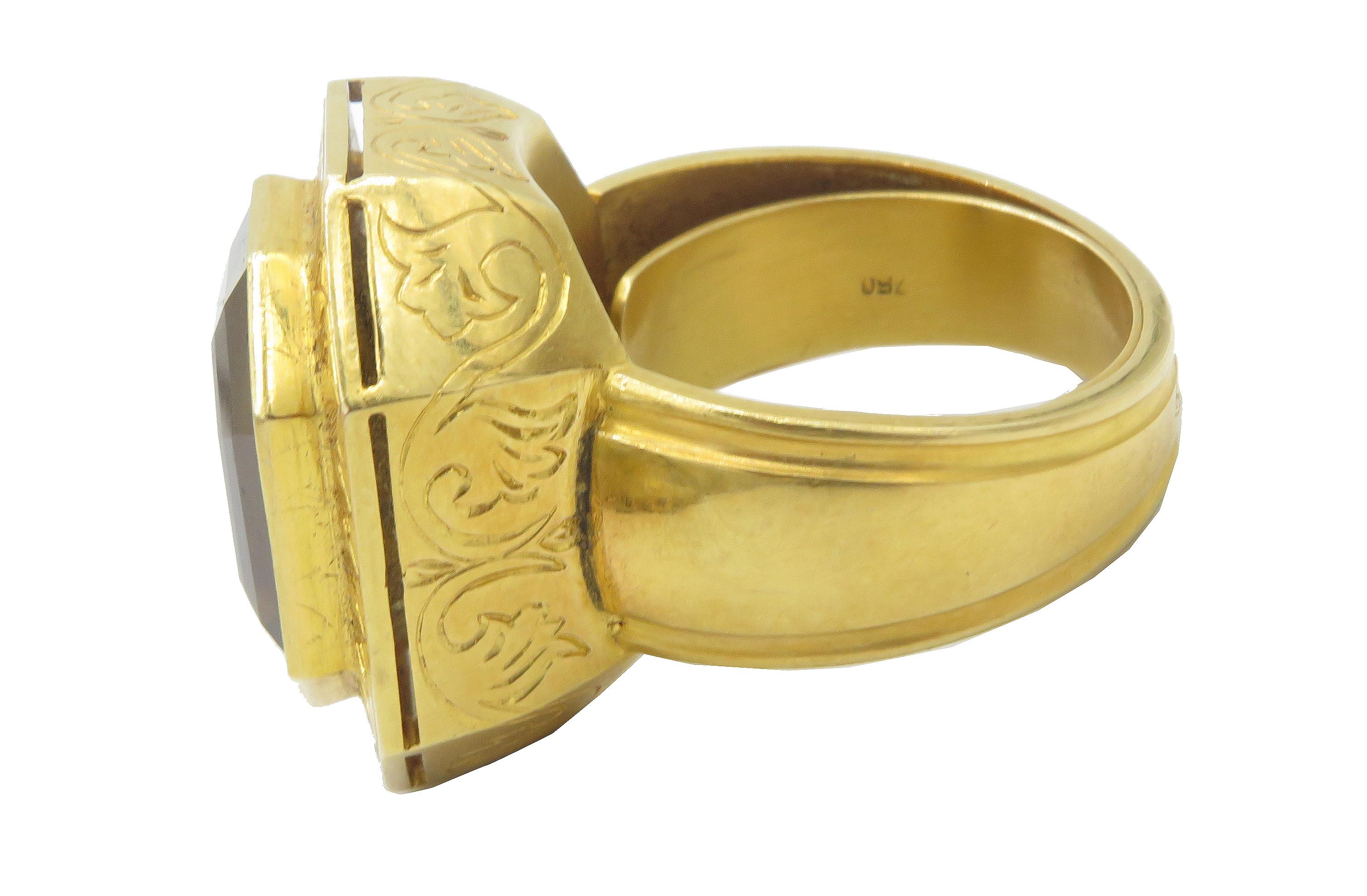 This a beautiful, 18kt yellow gold Citrine Bishop's ring. A, fabulous bishop's ring that came from an important bishops ring collection. This, beautiful ring weighs 31.58 grams and features a guard as well. 
us ring size 14 1/4 has butterfly spring
