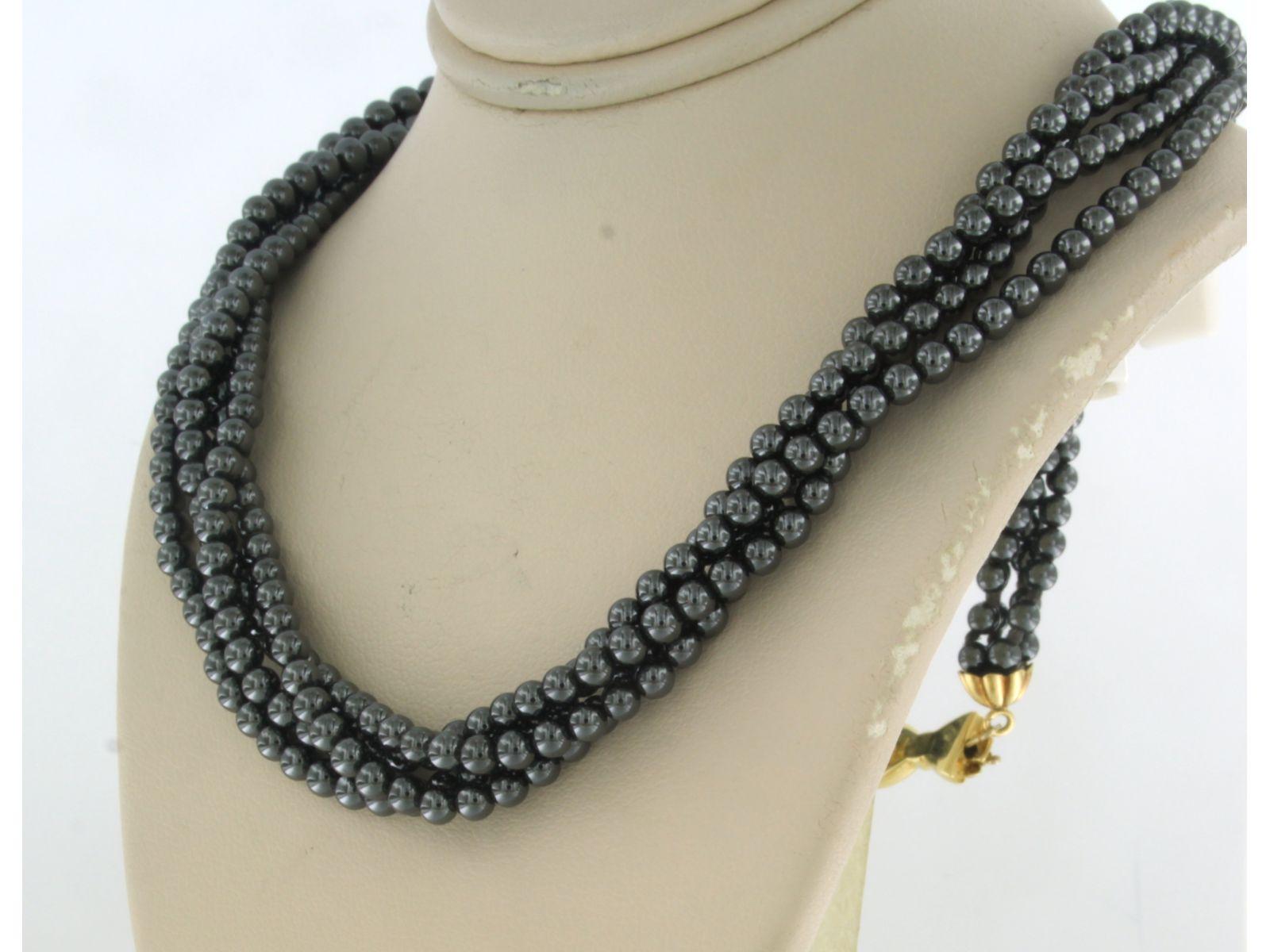 Bead 18k yellow gold clasp on a hematite bead necklace - 40 cm long For Sale