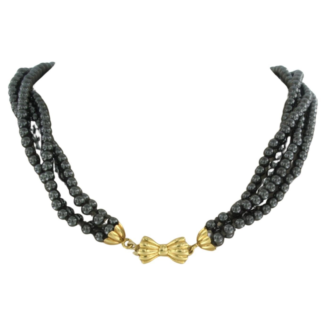 18k yellow gold clasp on a hematite bead necklace - 40 cm long For Sale
