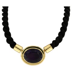 Fermoir en or jaune 18 carats serti d'une améthyste sur un collier de corde noire - 28,4 grammes