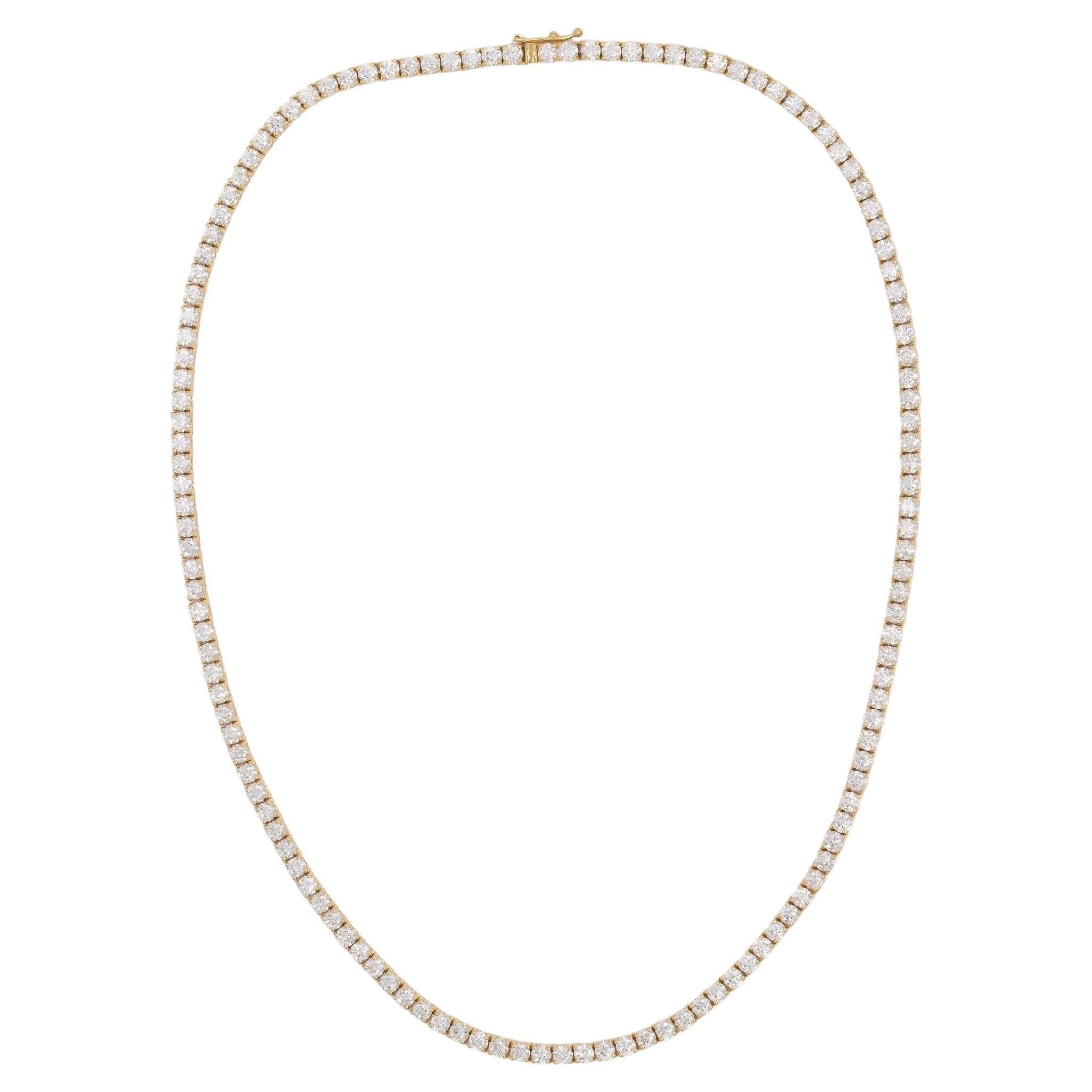 Handmade 18K Yellow Gold Classic Diamond Tennis Necklace with 131 Round Brilliant Cut Diamonds D color VVS1 clarity, weighting a total of 14.00 carats, This stunning piece is 17.00 inches long. 


Viewings available in our NYC wholesale office by