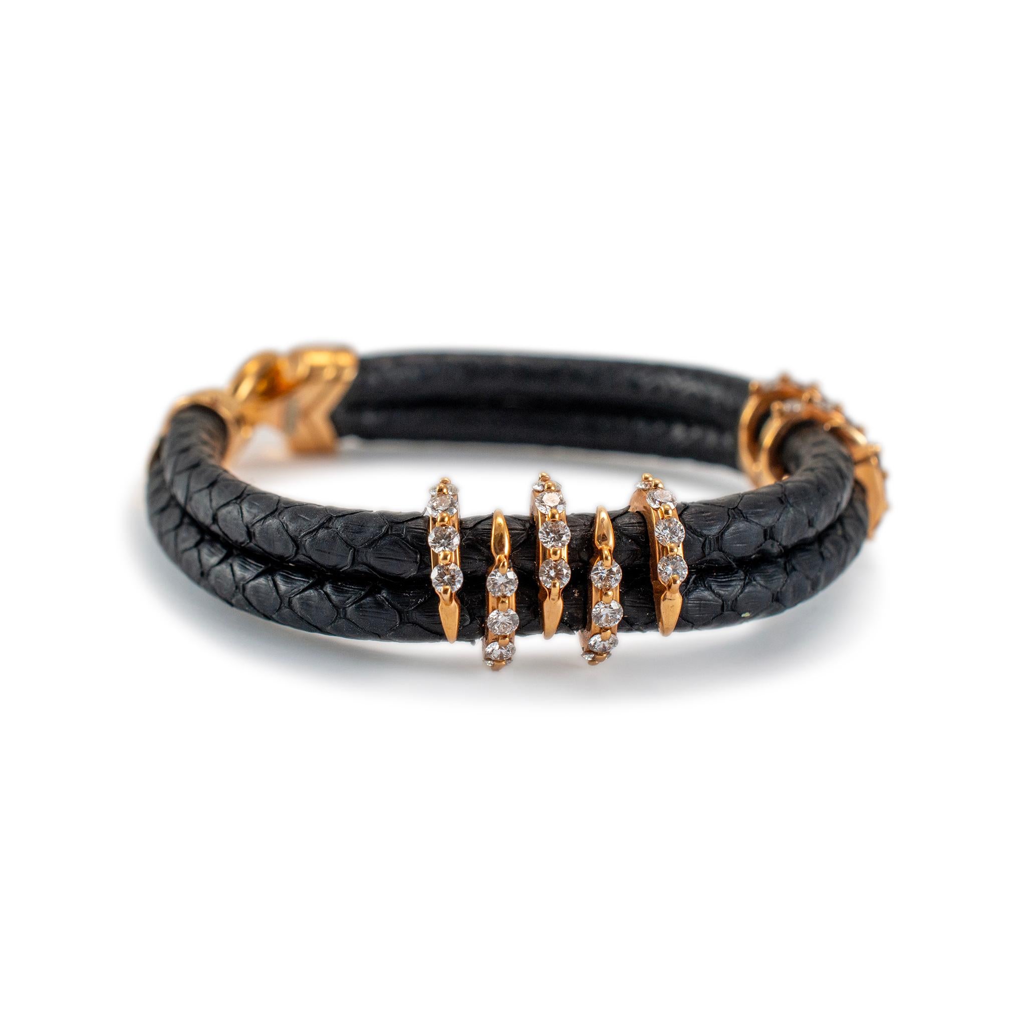 Gender: Unisex

Metal Type: 18K Yellow Gold

Length: 6.25 inches

Width: 11.20 mm

Weight: 25.82 grams

18K Yellow Gold diamond bangle bracelet. The metal was tested and determined to be 18K yellow gold. Engraved with 