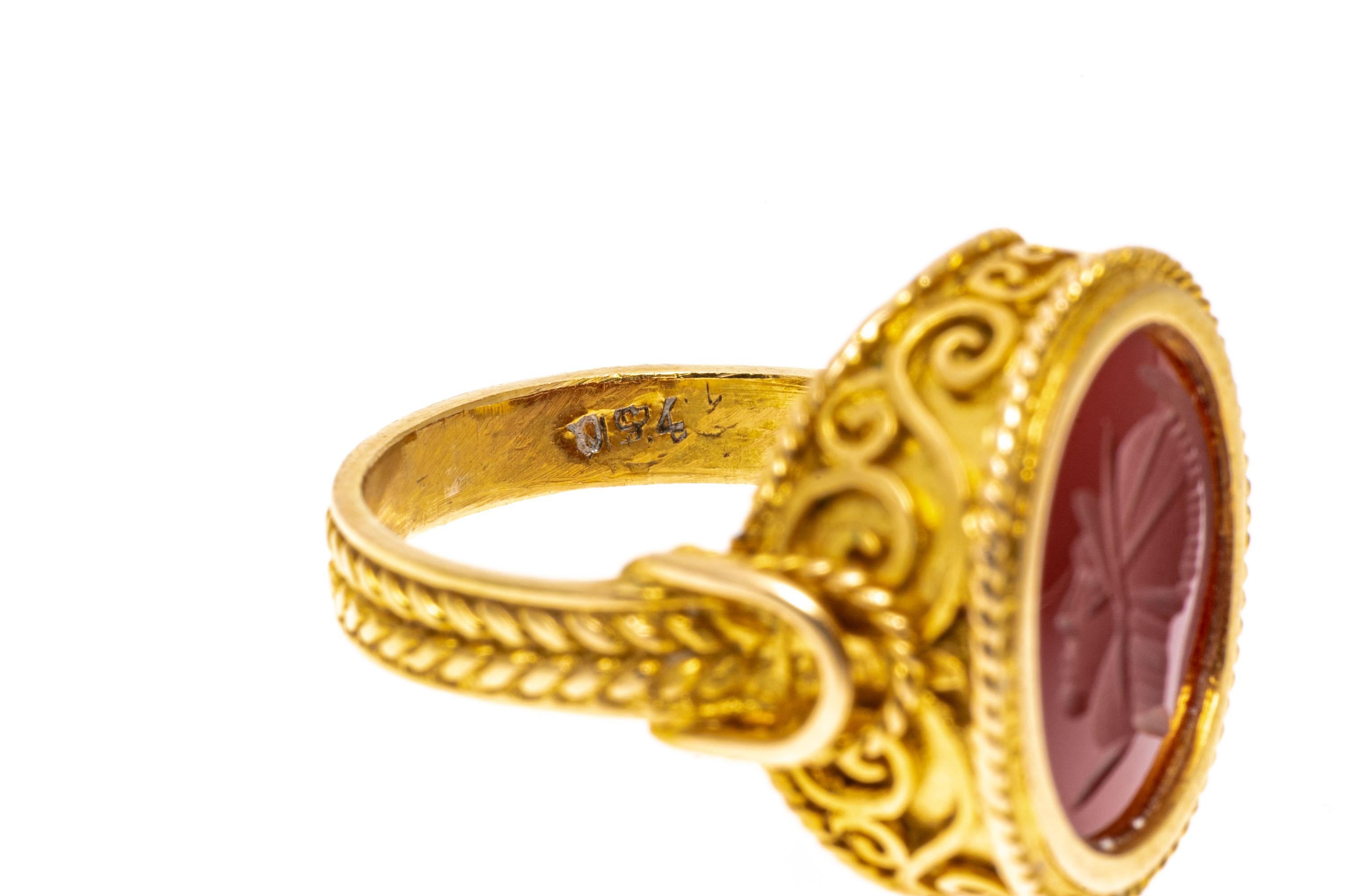 Oval Cut 18k Yellow Gold Contemporary Ornate Carnelian Intaglio Ring For Sale