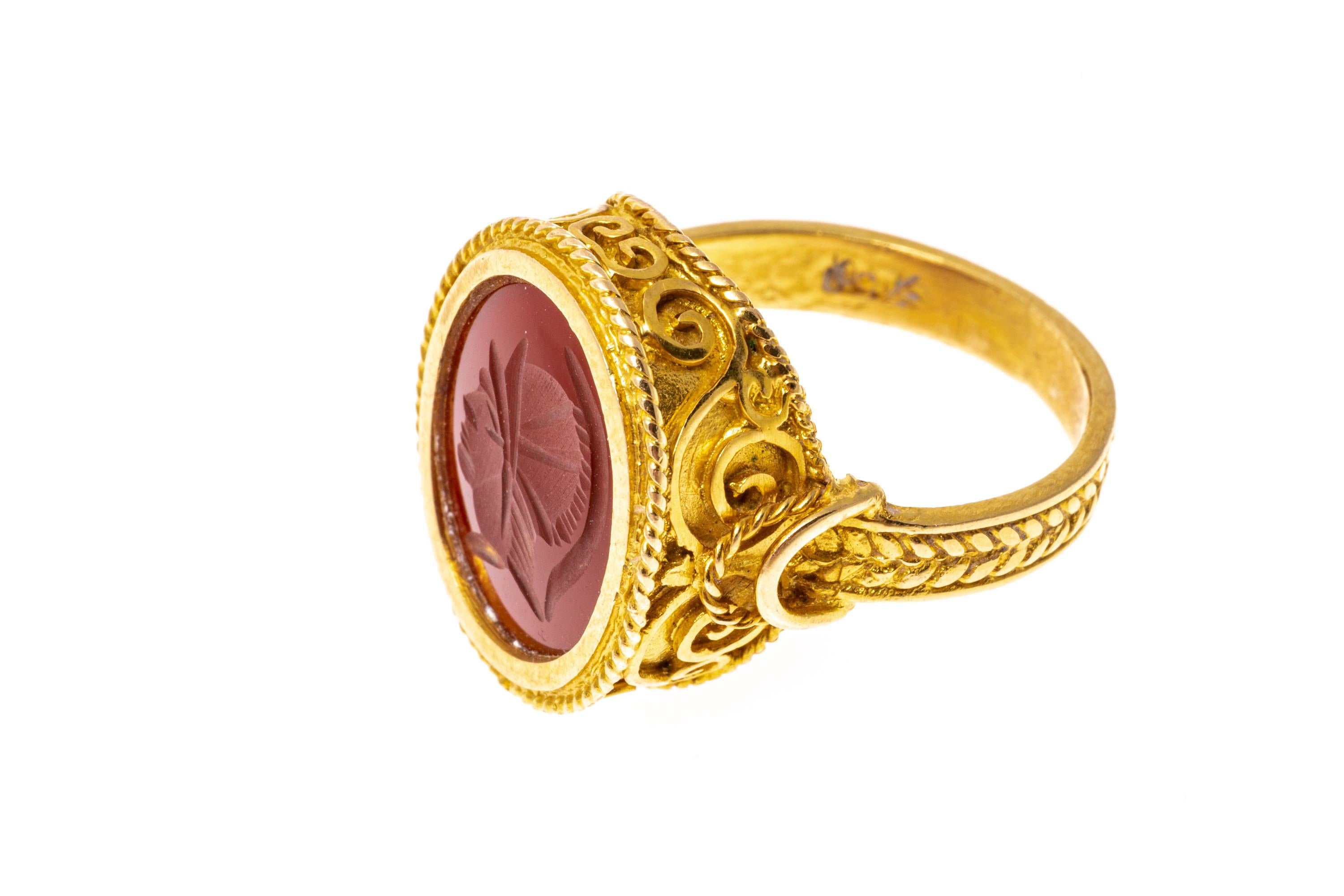 18k Yellow Gold Contemporary Ornate Carnelian Intaglio Ring In Good Condition For Sale In Southport, CT