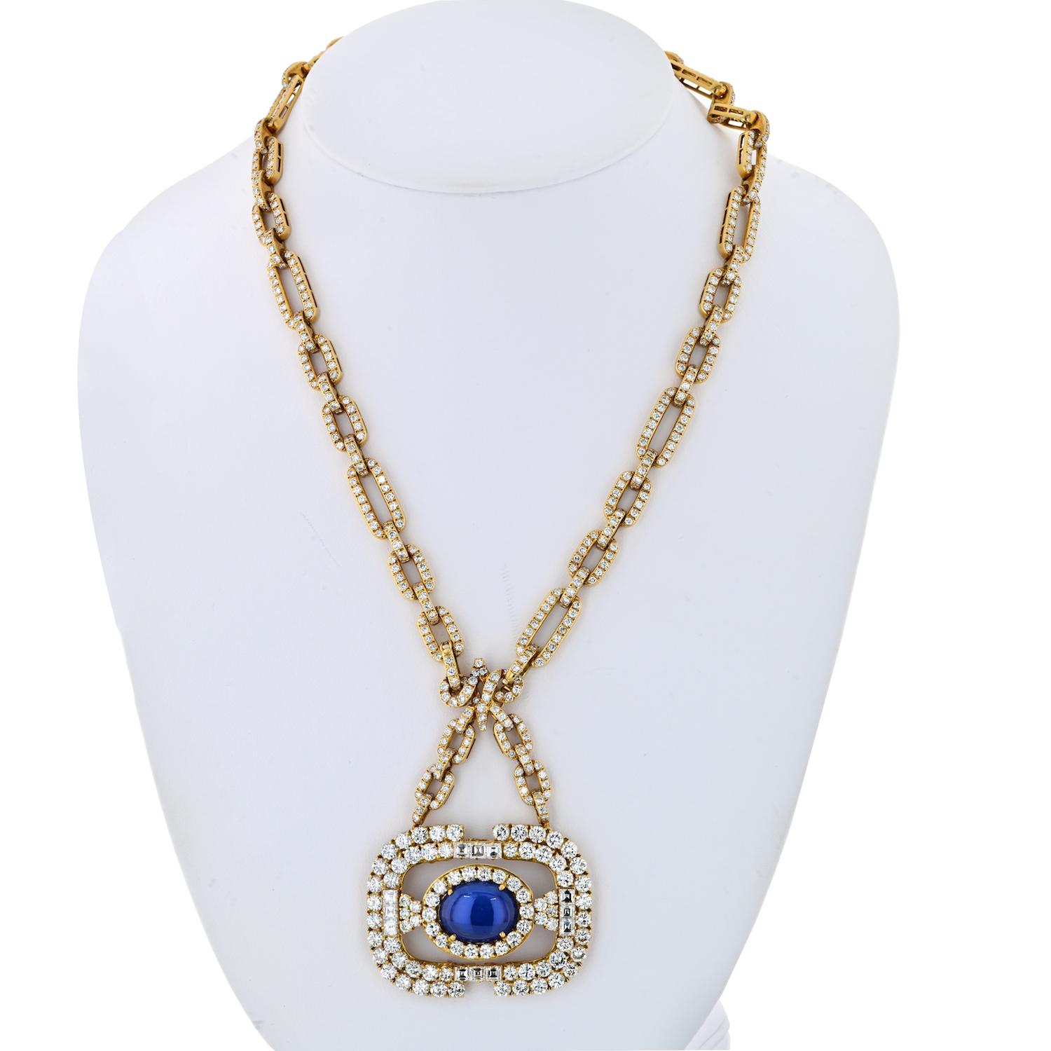 Diamond necklace with detachable sapphire pendant. 
Circa 1970's.
Cabochon blue sapphire: 18cts
Diamonds: 36cttw
Chain Length: 18 inches
Pendant Length: 2.5 inches
Sapphire Dimentions: 18.2mm x 14mm 