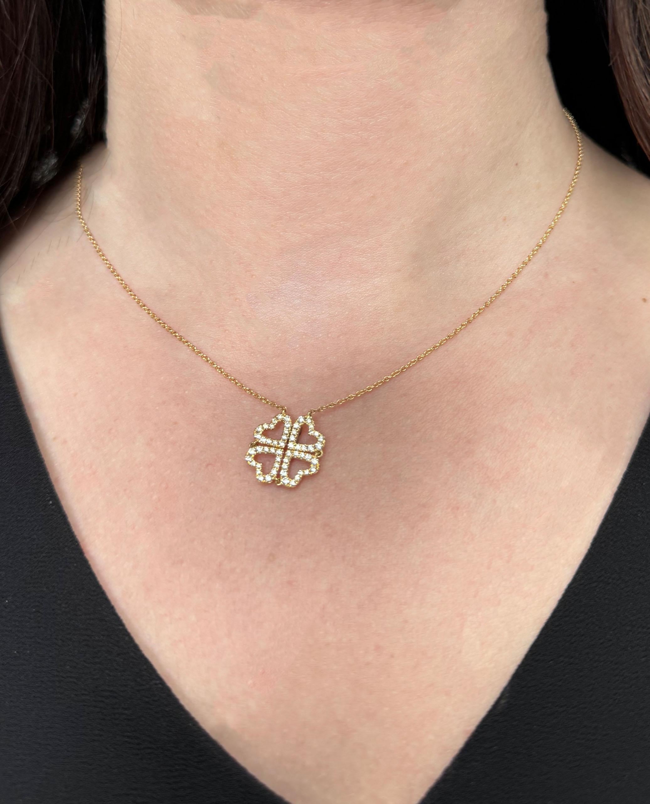 18K yellow gold convertible four heart necklace furnished with round faceted diamonds weighing 0.38 carats total.

- Can be worn 16 or 18 inches long
- Diamonds are G color, VS2/SI1 clarity
- Can be worn straight or as a four leaf clover
- Hearts