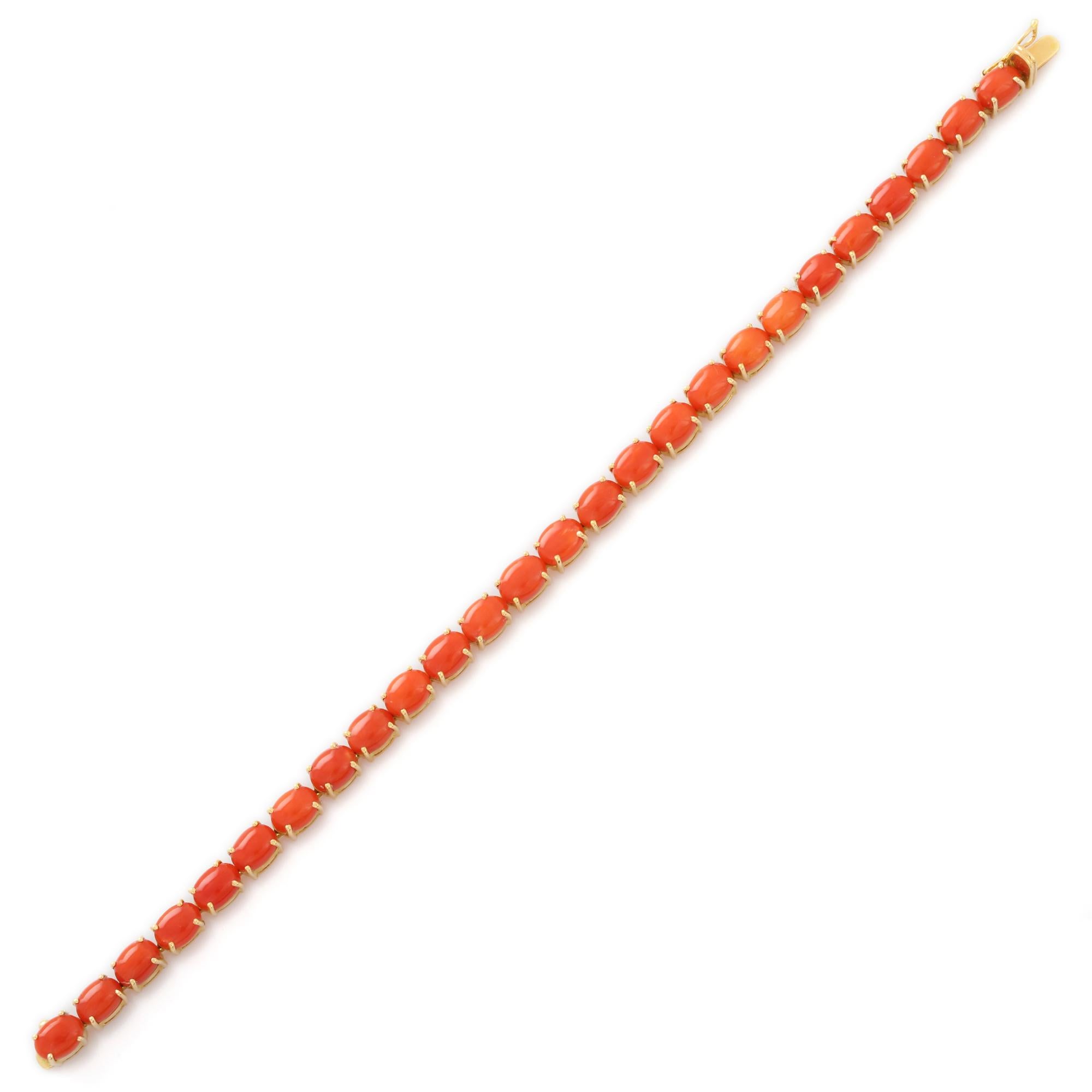 This Coral Tennis Bracelet in 18K gold showcases 26 endlessly sparkling natural coral, weighing 20.15 carats. It measures 7.5 inches long in length. 
Coral is a symbol of good luck and fortune.
Designed with perfect oval cut coral set in repetition