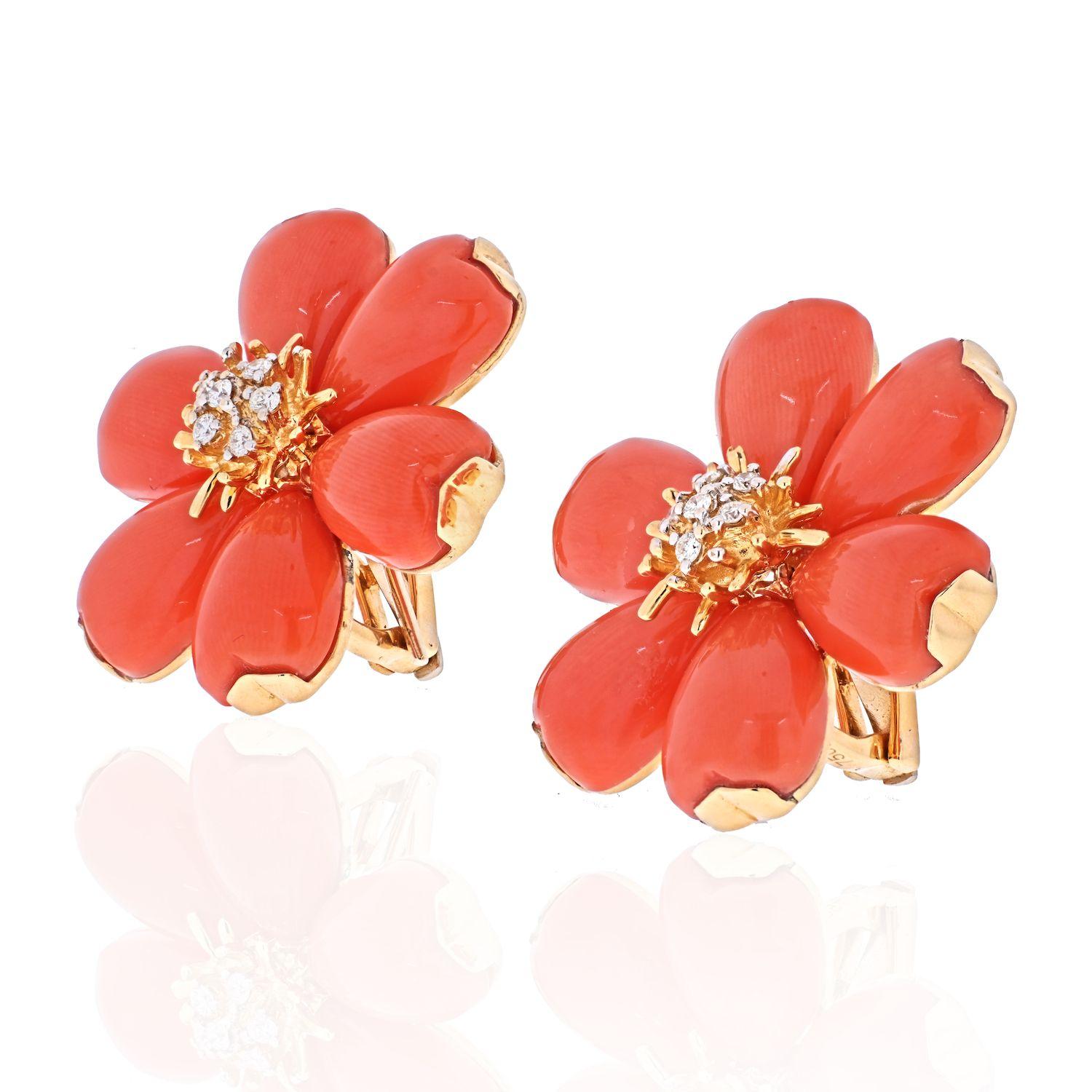 This is a pair of large earrings made in 18K yellow gold, mounted with round cut diamonds and are made of lovely bright orange coral. 
Clip on closure, where the posts can be added. 
These earrings are about 1.1 inches wide. 
