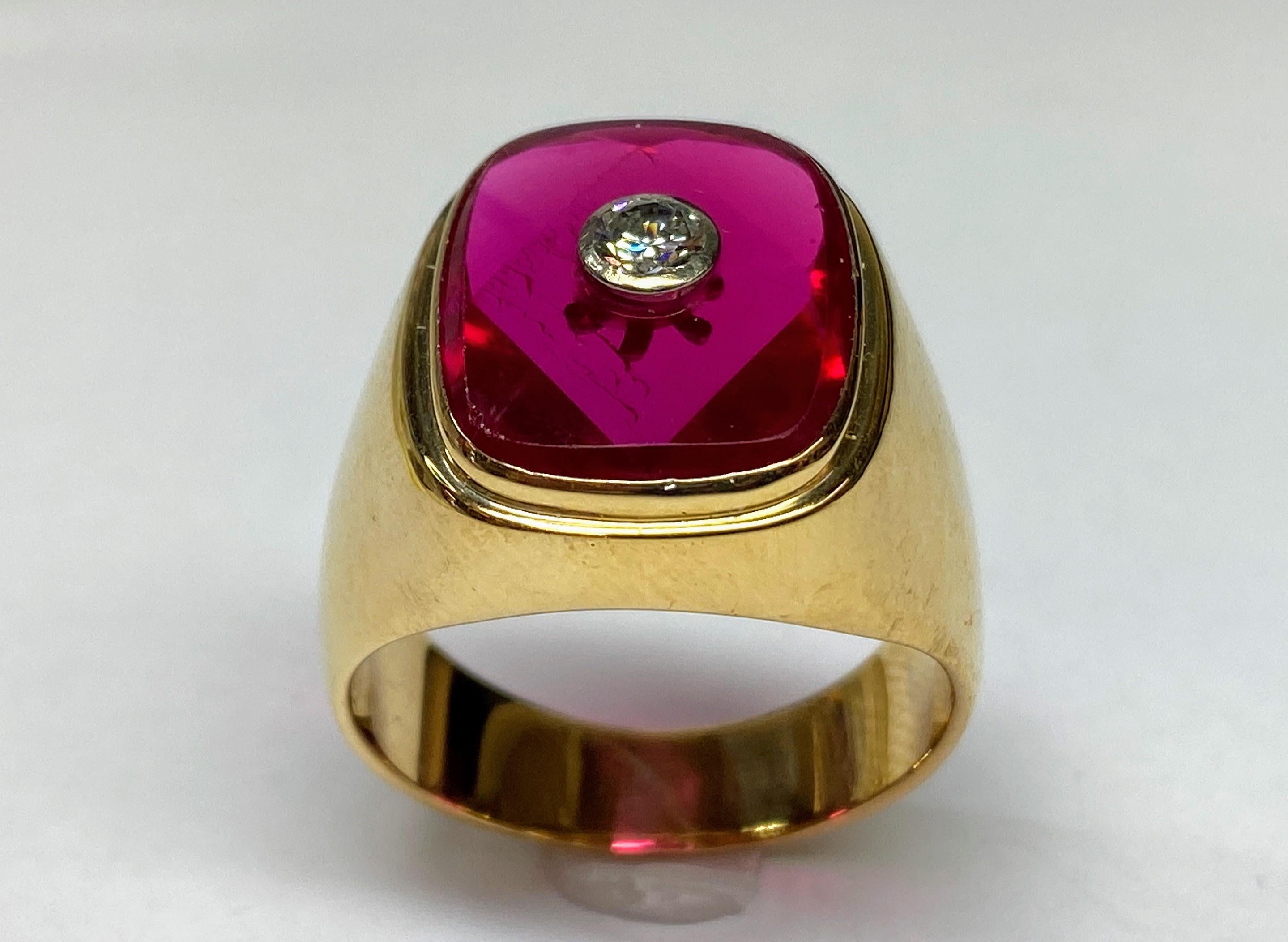 18K Yellow Gold 5.73TCW Created Ruby & Brilliant Diamond Ring Size- 12.5

This distinguished signet ring, crafted in sumptuous 18K yellow gold, presents a marriage of classic design with modern flair, tailored for a ring size of 12.5. It showcases a