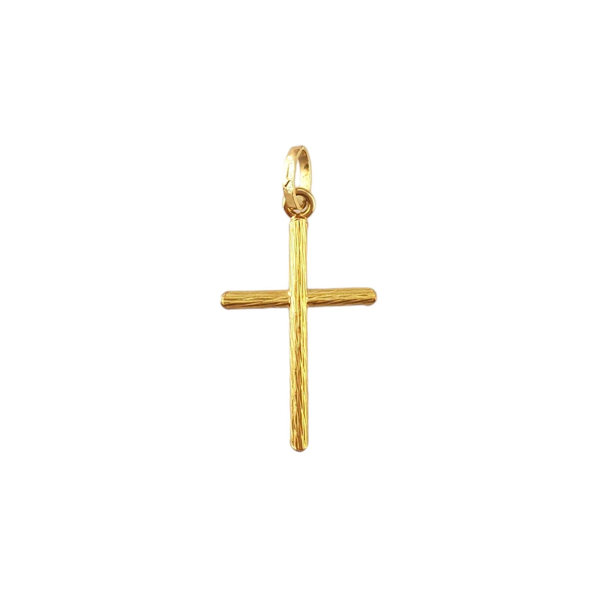 18K Yellow Gold Cross Charm 

This timeless cross charm features a toothpick design with bark finish crafted from 18K yellow gold.

Hallmark: 81 AR 750

Weight: 1.4 g/ 0.9 dwt.

Size: 29.1 mm X 17.4 mm X 2.4 mm

Very good condition, professionally