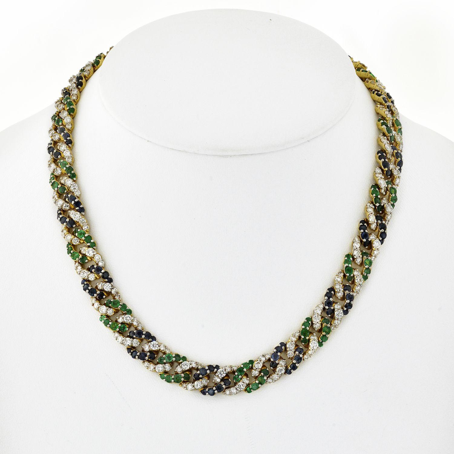 Cuban link color stone necklace. 
Mounted with diamonds, sapphires, and emeralds. 
18K Yellow Gold Cuban Link Diamond, Sapphire and Green Emerald Necklace.
16.5 inches. 100gr.