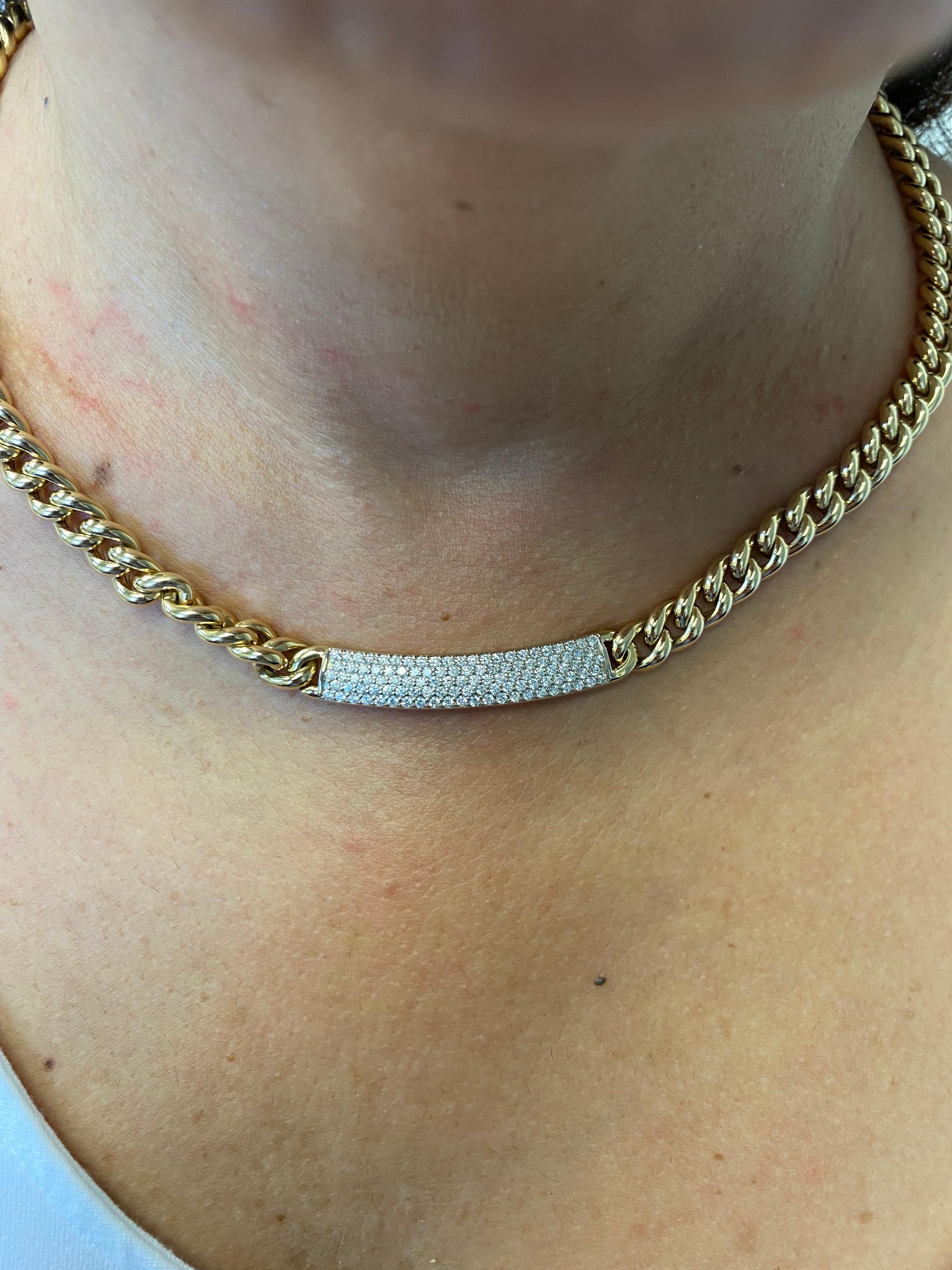 Italian Diamond necklace set in 18K yellow gold. The necklace is set in a Cuban chain link. The diamonds are set in a pave' and the total weight is 2.32 carats. The stones are G color, and the clarity is SI1. The necklace is 16 inches in length.