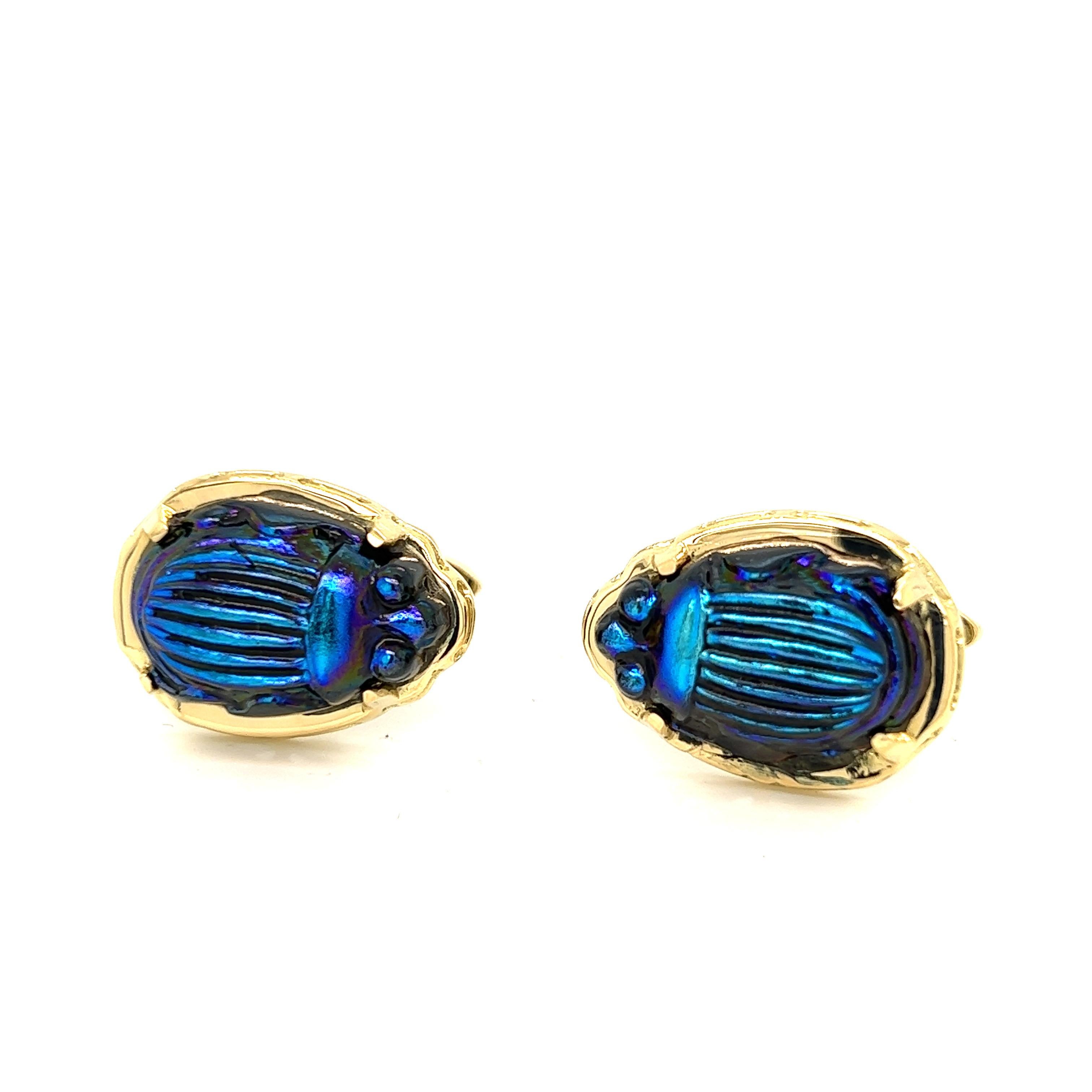 18k Yellow Gold Cufflinks with Vintage Tiffany Favrile Cobalt Blue Glass Scarabs.
Swivel backings.
Hand made in NYC.

Measurements: 22.2mm x 16.4mm