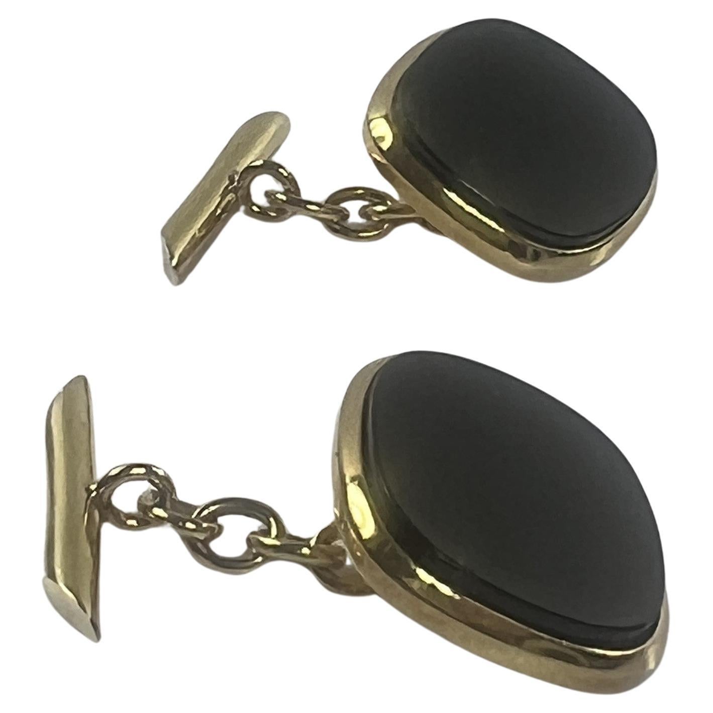 Bracciali in oro giallo 18k con onice