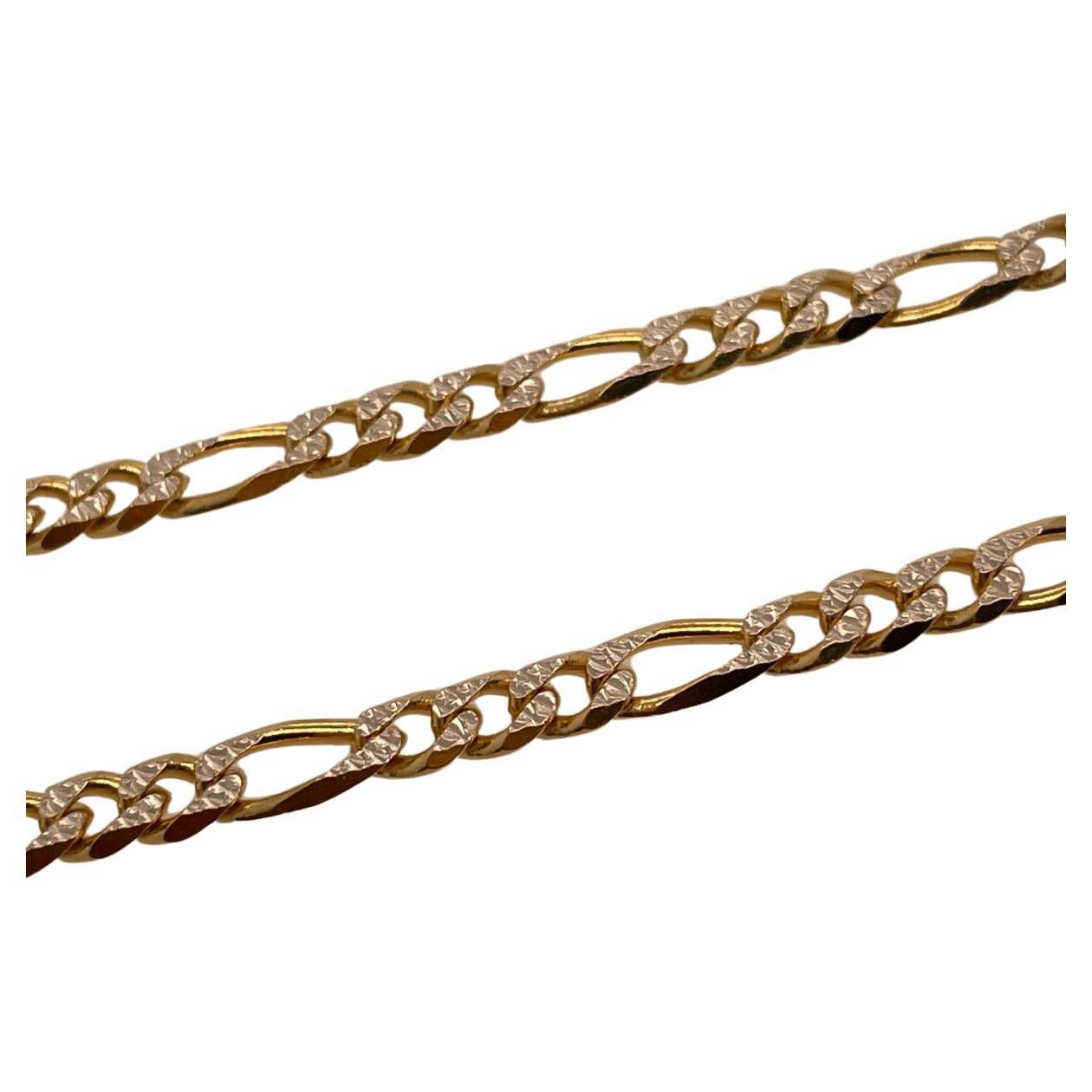 18k yellow gold curb link style chain with white gold detail 