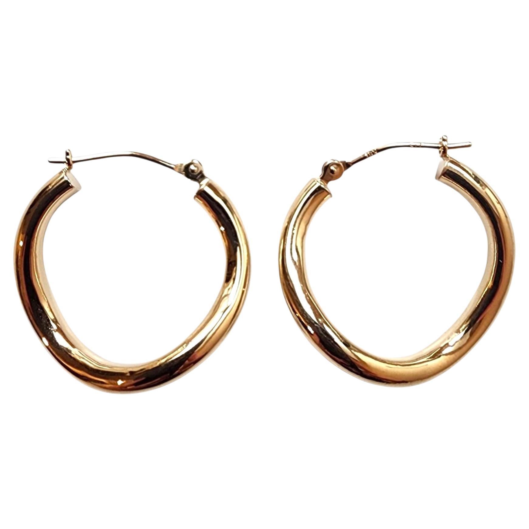 Pendientes de aro curvados de oro amarillo de 18 quilates #22785 en venta