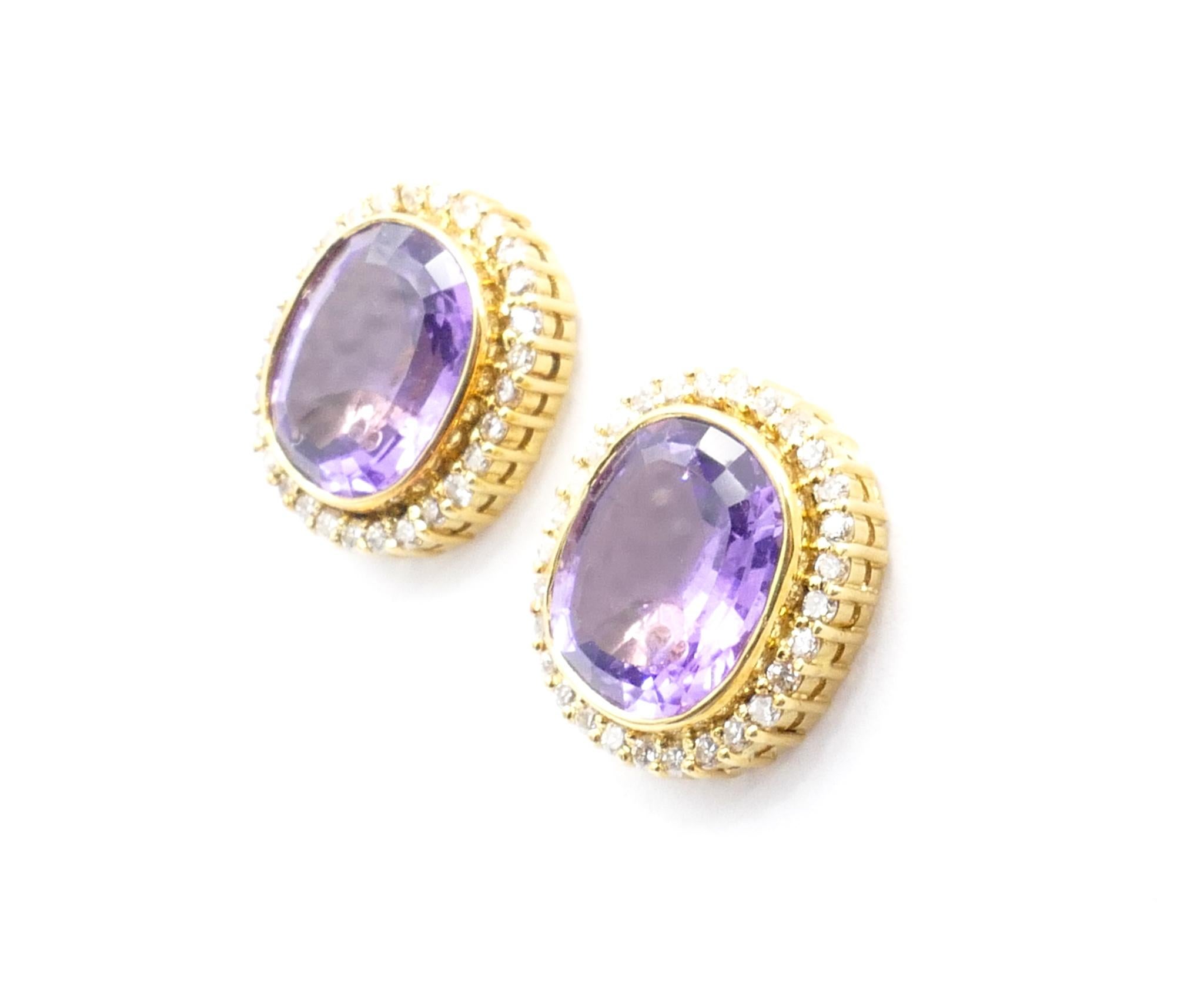 Rarely do we find now a really high quality set of Clip On earrings.
These are beautiful.
Each Earring consists of a Cushion Cut Amethyst bezel set in 18ct Yellow Gold with a border of 29 high level - G/SI -  round brilliant cut Diamonds.

The