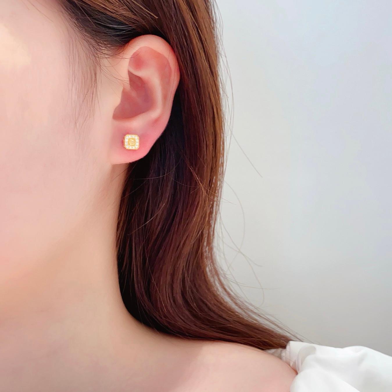 Modern 18K Yellow Gold Cushion-Cut Yellow Diamond & Diamond Stud Earrings For Sale