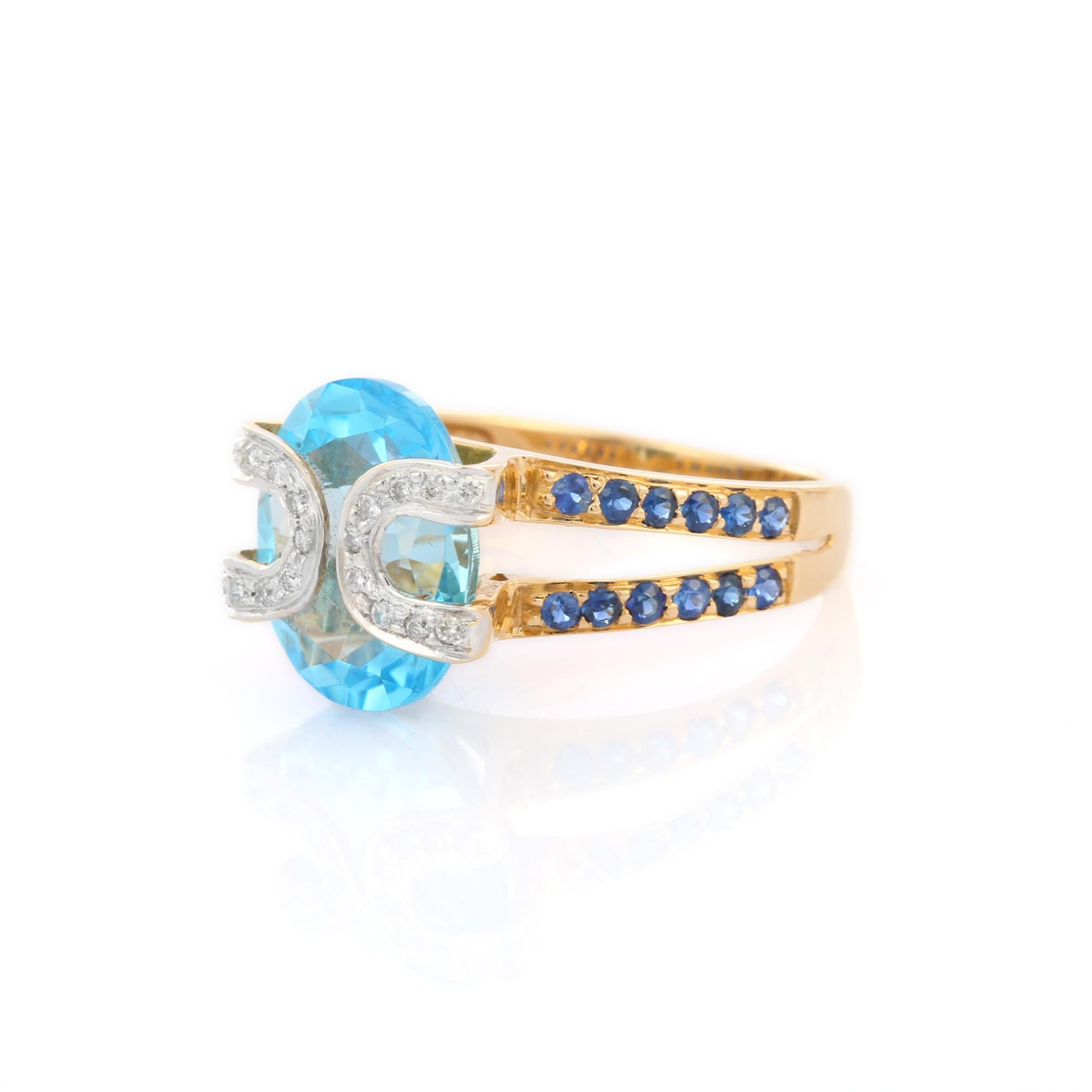 For Sale:  18K Yellow Gold Designer Blue Topaz Cocktail Ring with Sapphire and Diamonds 2