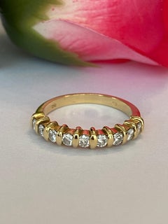 Anello di fidanzamento "Half Eternity" in oro giallo 18 carati con diamante da 0,45 carati