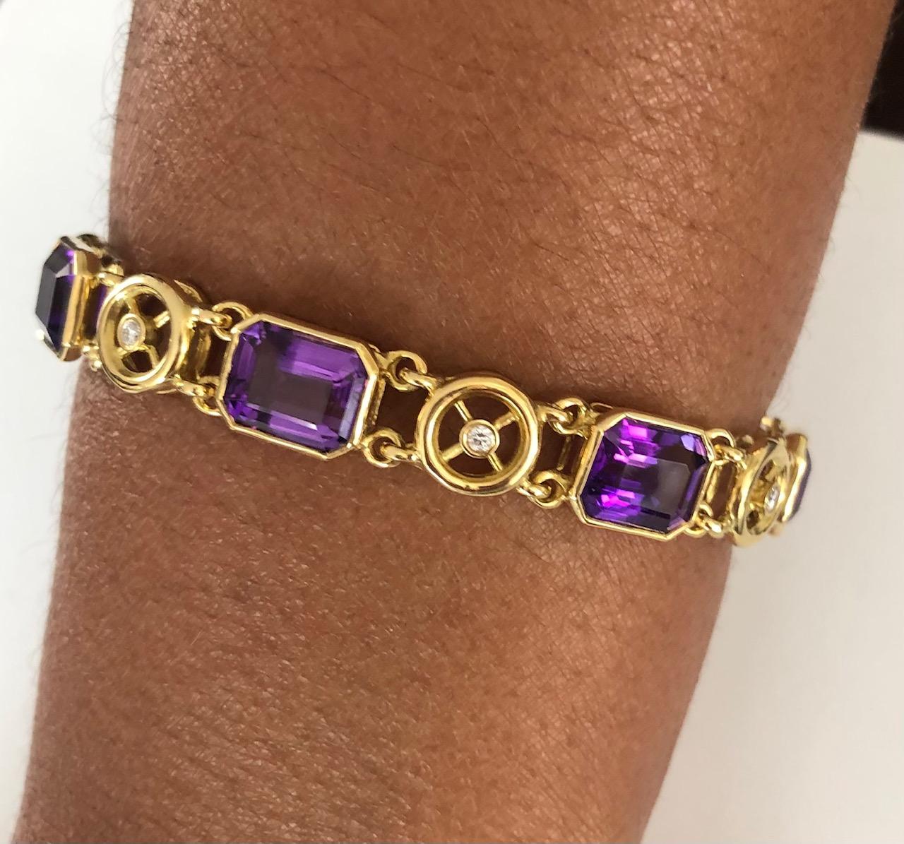 Great design 18k Yellow Gold Bracelet, set with 7 round Diamonds 0.21 carats and 7 Emerald Cut Amethysts 20.00 carats.

We design and manufacture our jewelry in our workshop, located in New York City's diamond district.