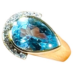 18k Yellow Gold Diamond And Blue Topaz Ring
