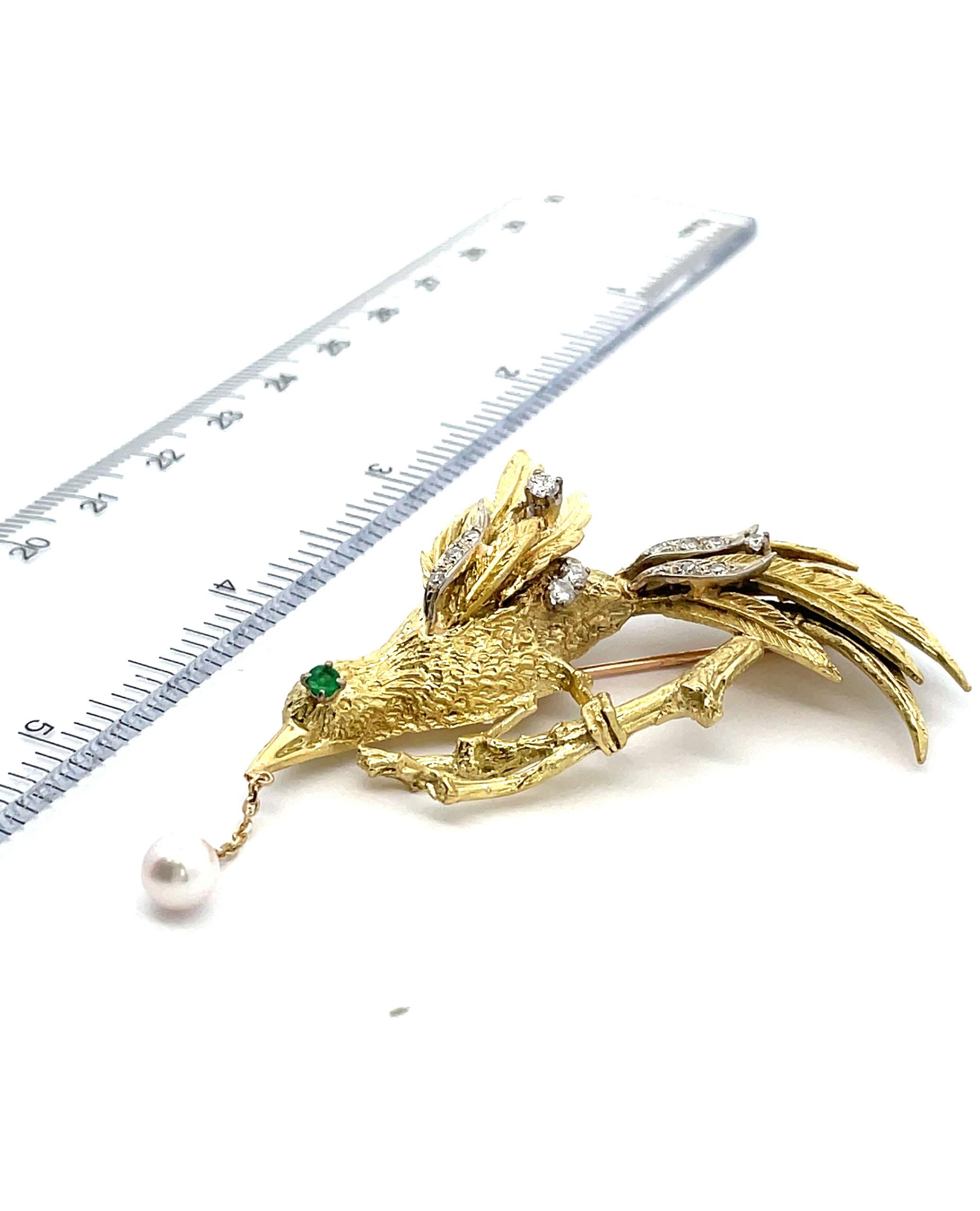 Contemporary 18K Yellow Gold Diamond and Emerald Bird Brooch with Dangling Pearl For Sale