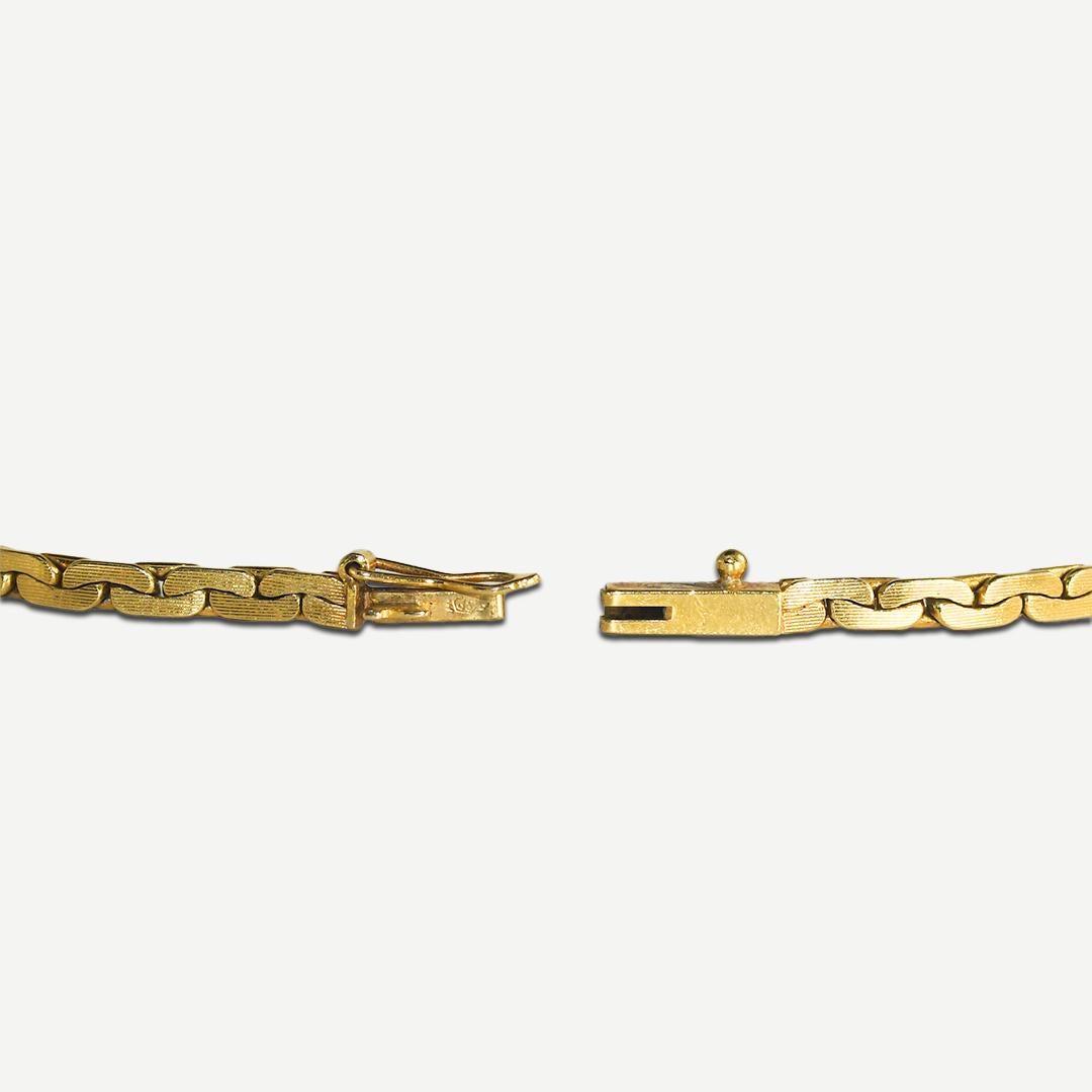 Armband aus 18 Karat Gelbgold mit Diamanten und Smaragden 8.8 g 2