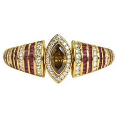 Armband aus 18 Karat Gelbgold mit Diamanten und Rubinen