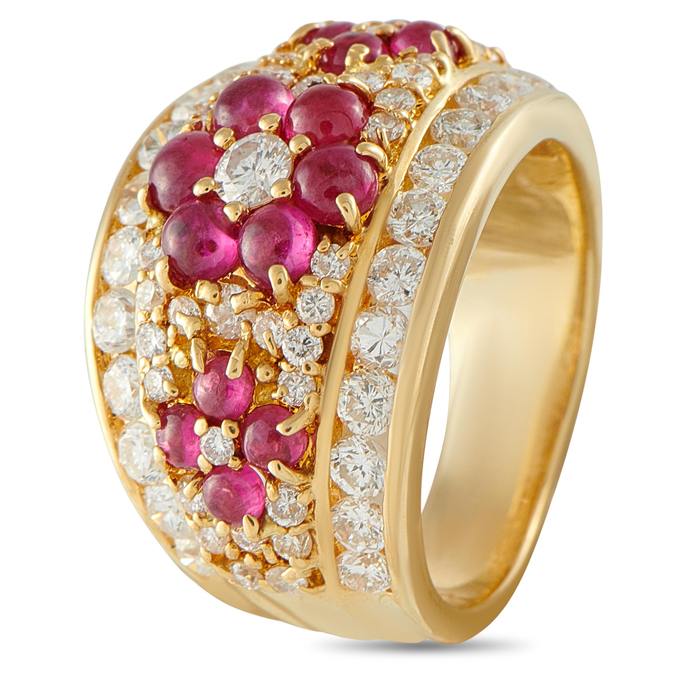 Theres something incredibly captivating about this detailed 18K Yellow Gold ring. At the top of the design, rounded Ruby gemstones with a total weight of 1.80 carats are arranged in a delicate floral pattern. Diamonds totaling 2.02 carats make this