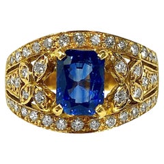 Cocktailring aus 18 Karat Gelbgold mit Diamanten und Saphiren
