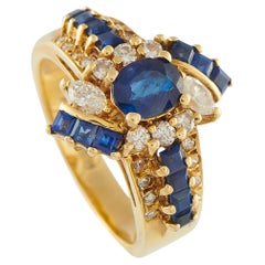 Anello con diamanti e zaffiri in oro giallo 18K