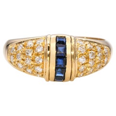 Bague en or jaune 18k avec diamant et saphir