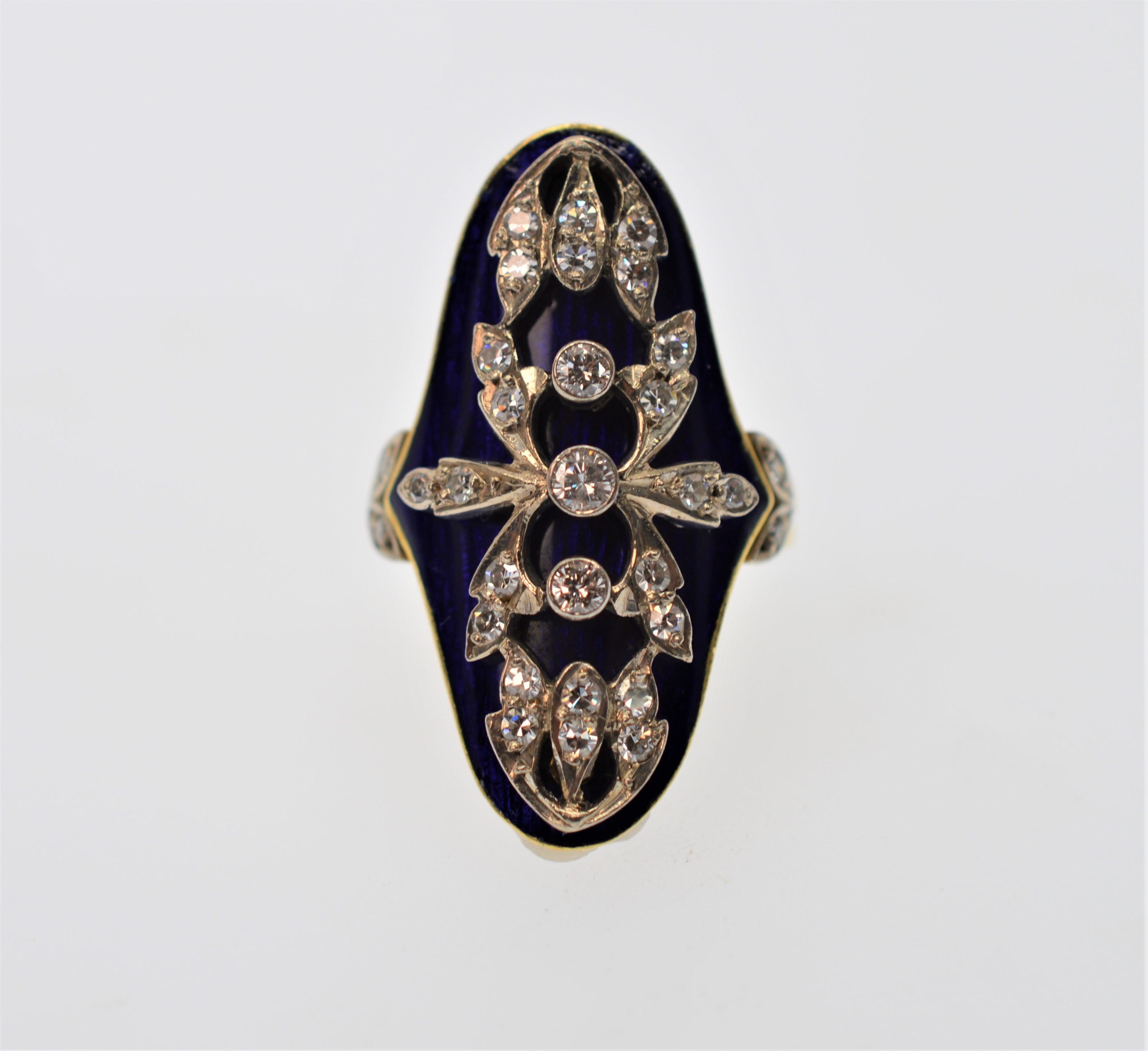 Diamond & 18K Yellow Gold Blue Italian Finely Hand-Crafted Enamel Ring. Circa 1950's, this magnificent oval shaped ring measures 1-1/4 x 3/4 inch and is artful adorned with thirty one diamonds (.61 cts) displayed on vivid blue enamel framed in 18K