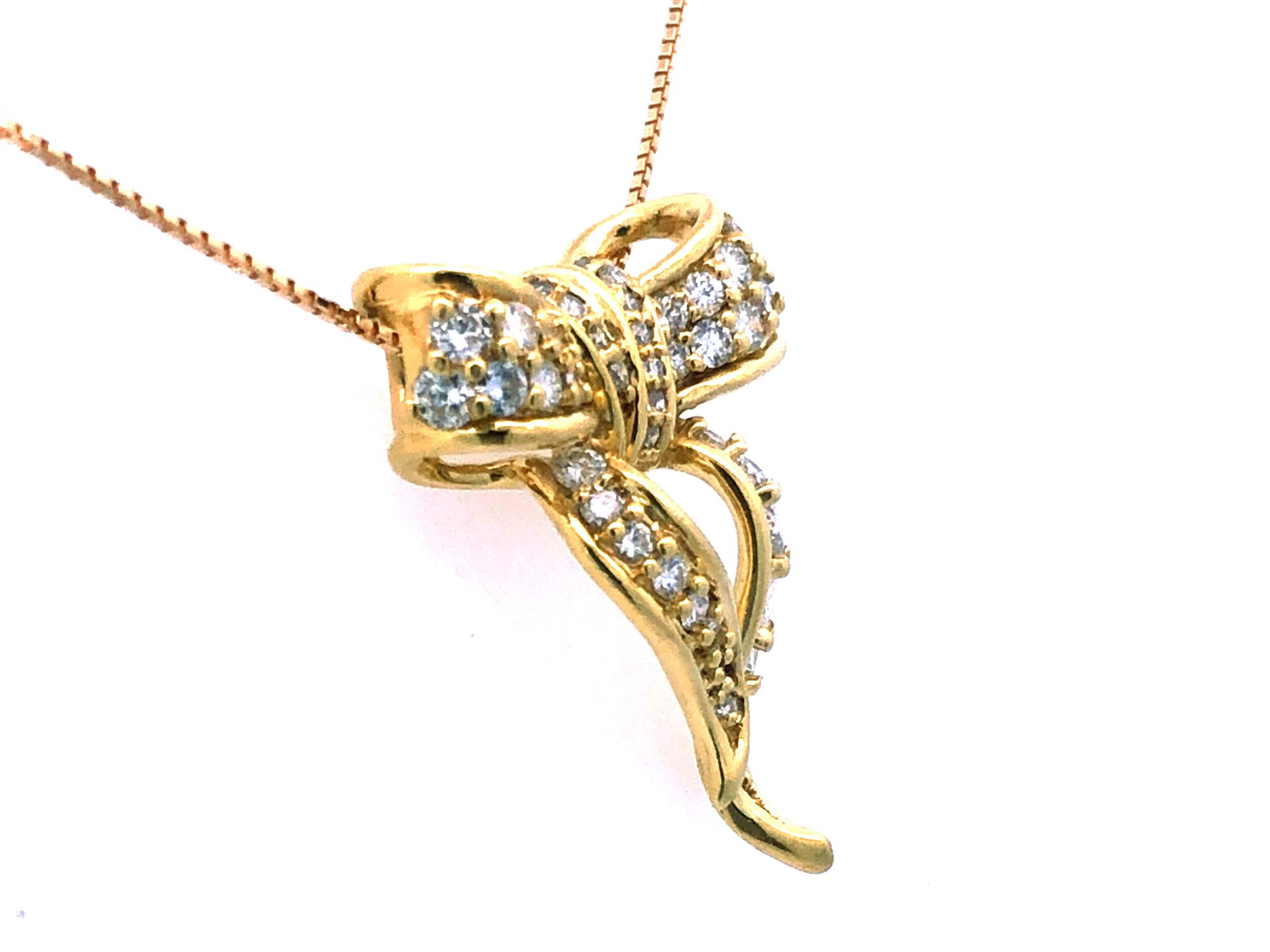 Anhänger und Kette aus 18 Karat Gelbgold mit Diamantschleife (Moderne)