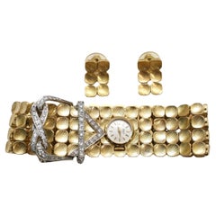 Pulsera de Diamantes de Oro Amarillo de 18k con Reloj Gruen Oculto y Juego de Pendientes a Juego