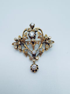 Spilla di diamanti in oro giallo 18 carati con diamanti a taglio singolo