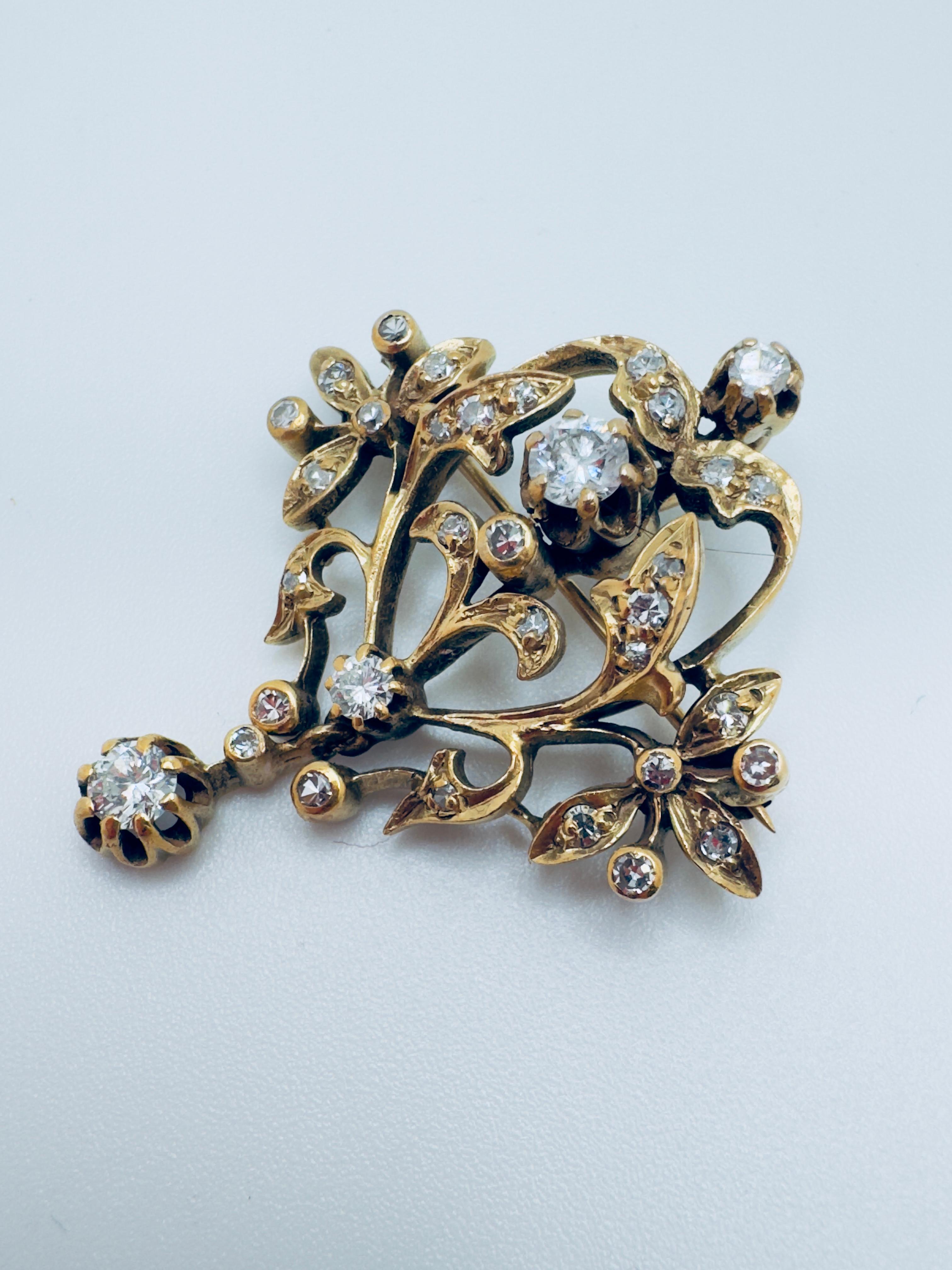 Art Déco Spilla di diamanti in oro giallo 18 carati con diamanti a taglio singolo in vendita