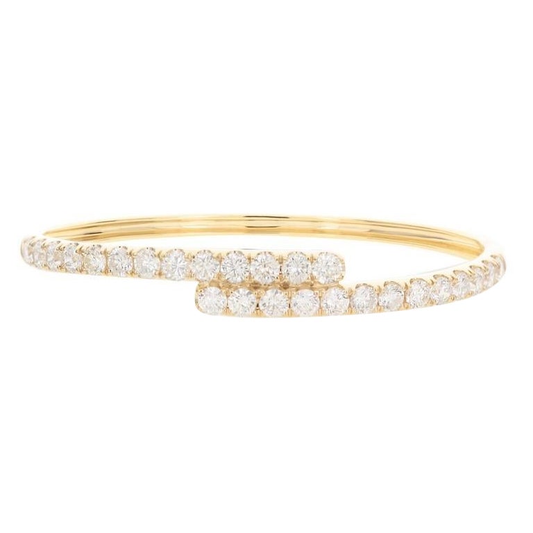 Bypass-Armreif aus 18 Karat Gelbgold mit Diamanten