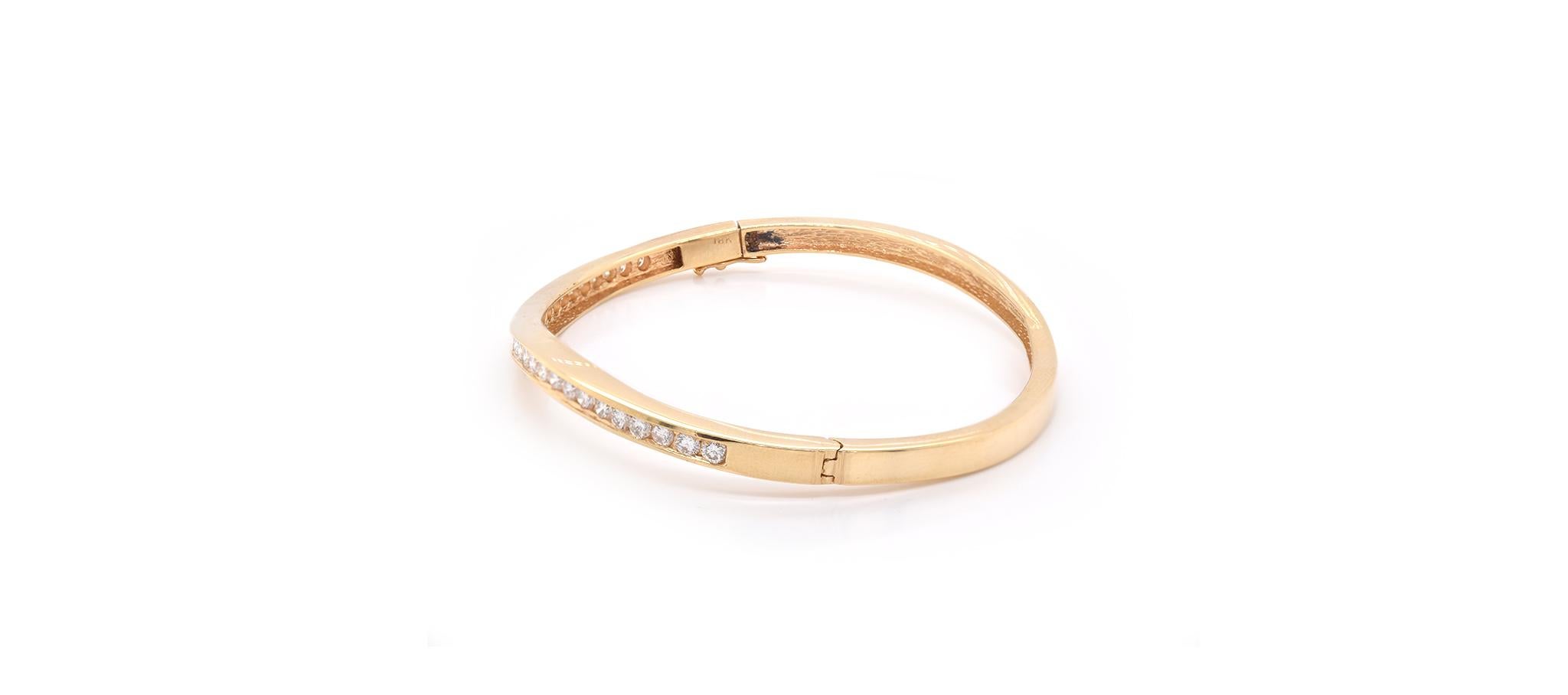 Material: 18k yellow gold
Diamonds: 27 round brilliant cuts = 1.00cttw
Color: G
Clarity: VS2
Dimensions: the bracelet measures 6.5-inches in length and 3.75mm in width
Weight: 15.0 grams
