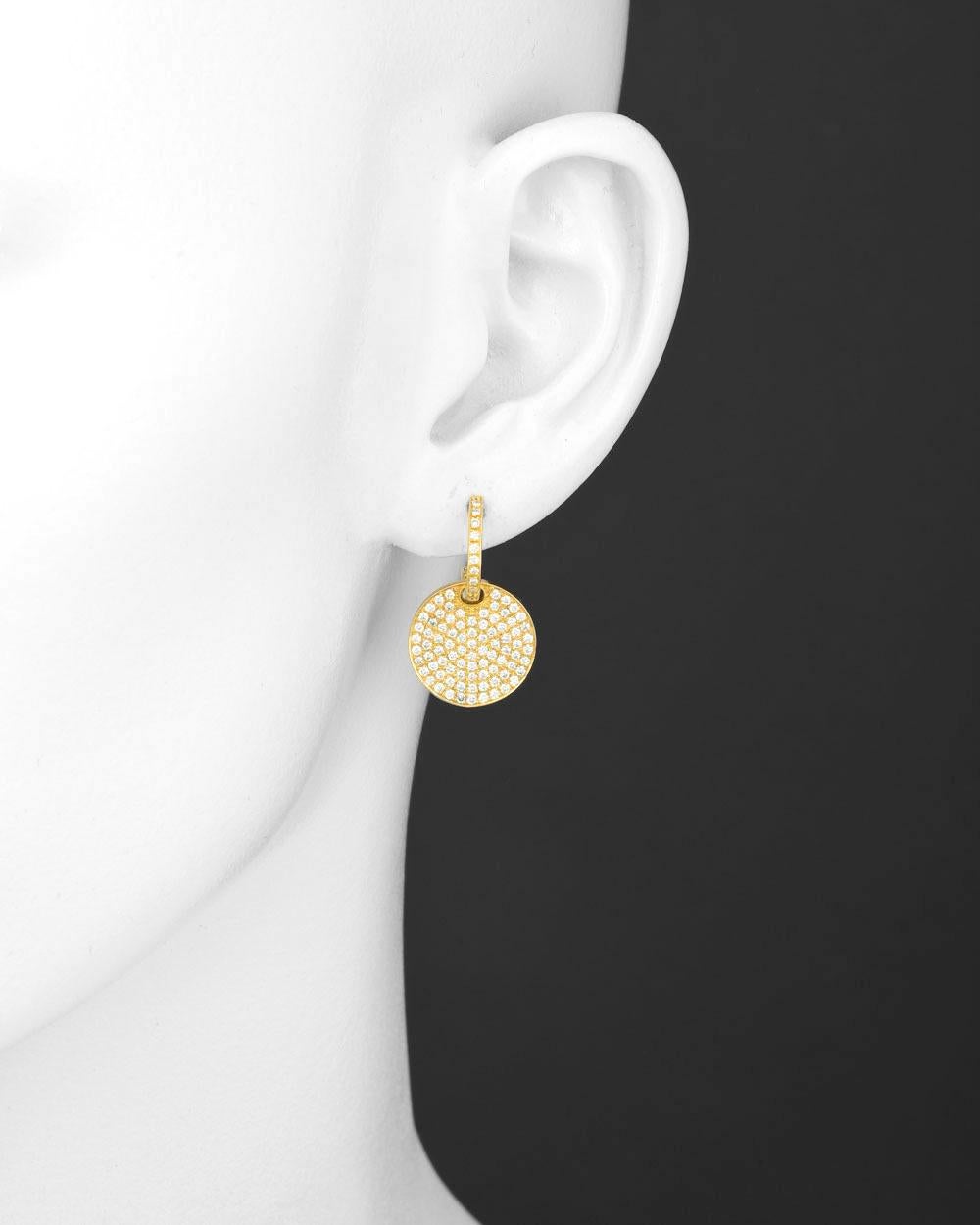 Drop earrings, featuring an elegant circular motif pavé-set with round brilliant-cut diamonds suspended from a delicate hoop set to the front with round-cut diamonds, in 18k yellow gold.

168 diamonds weighing 1.10 total carats (G-H color/SI