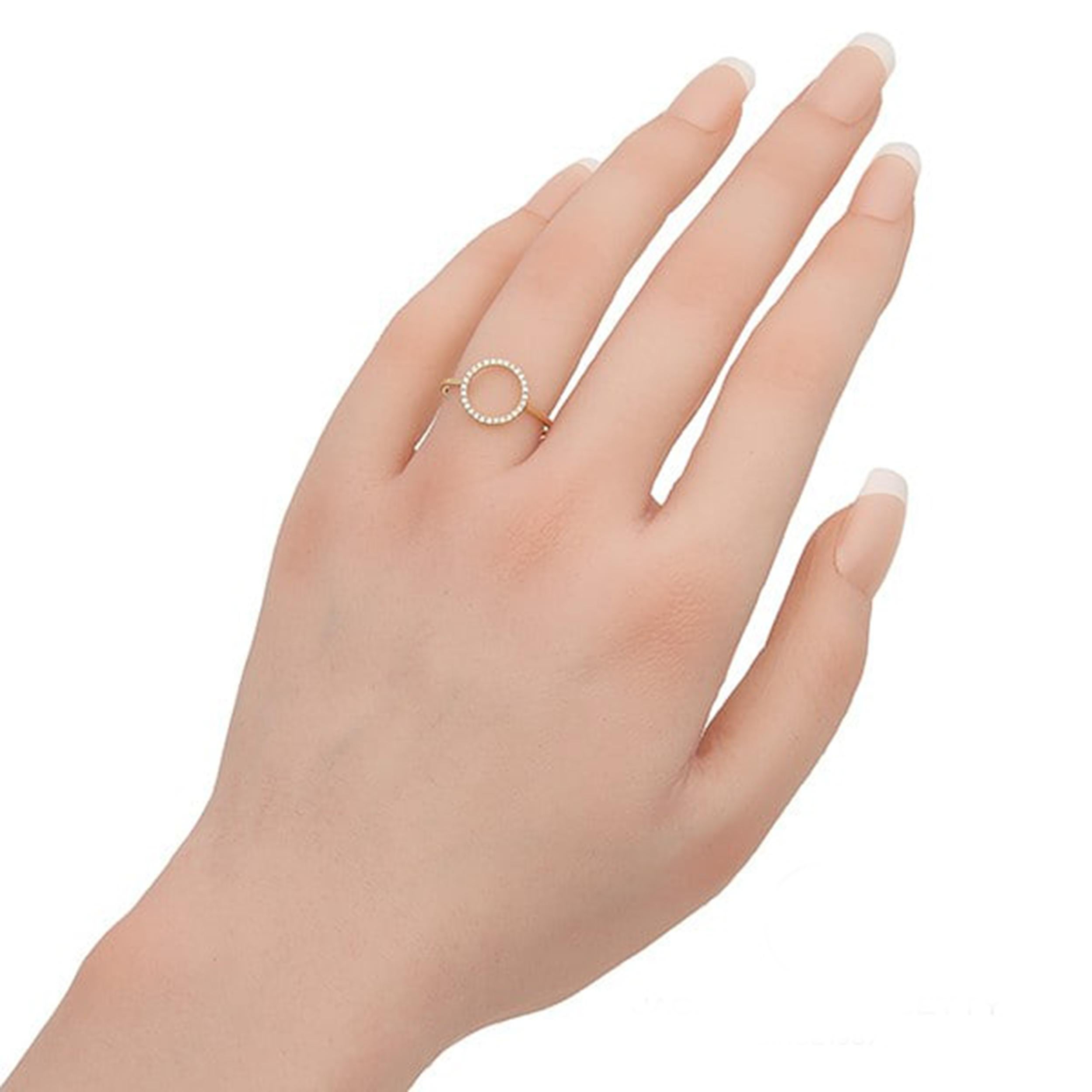 Elevate your style with this elegant 18K yellow gold diamond circle ring. Crafted from luxurious yellow gold, this ring features a sleek and modern design, perfect for adding a touch of sophistication to any outfit. The ring is adorned with a