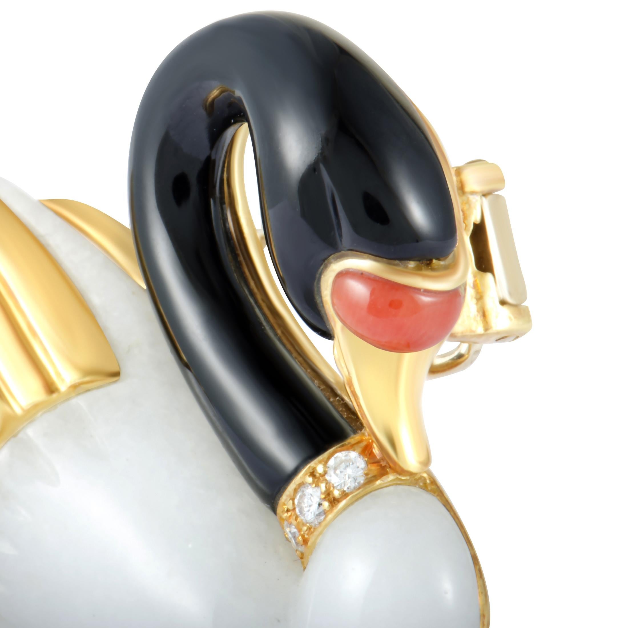 With its splendidly imaginative design and incredibly attractive décor, this gorgeous swan brooch will add a feminine touch to any ensemble of yours. The brooch is made of radiant 18K yellow gold and expertly set with coral, onyx and white jade