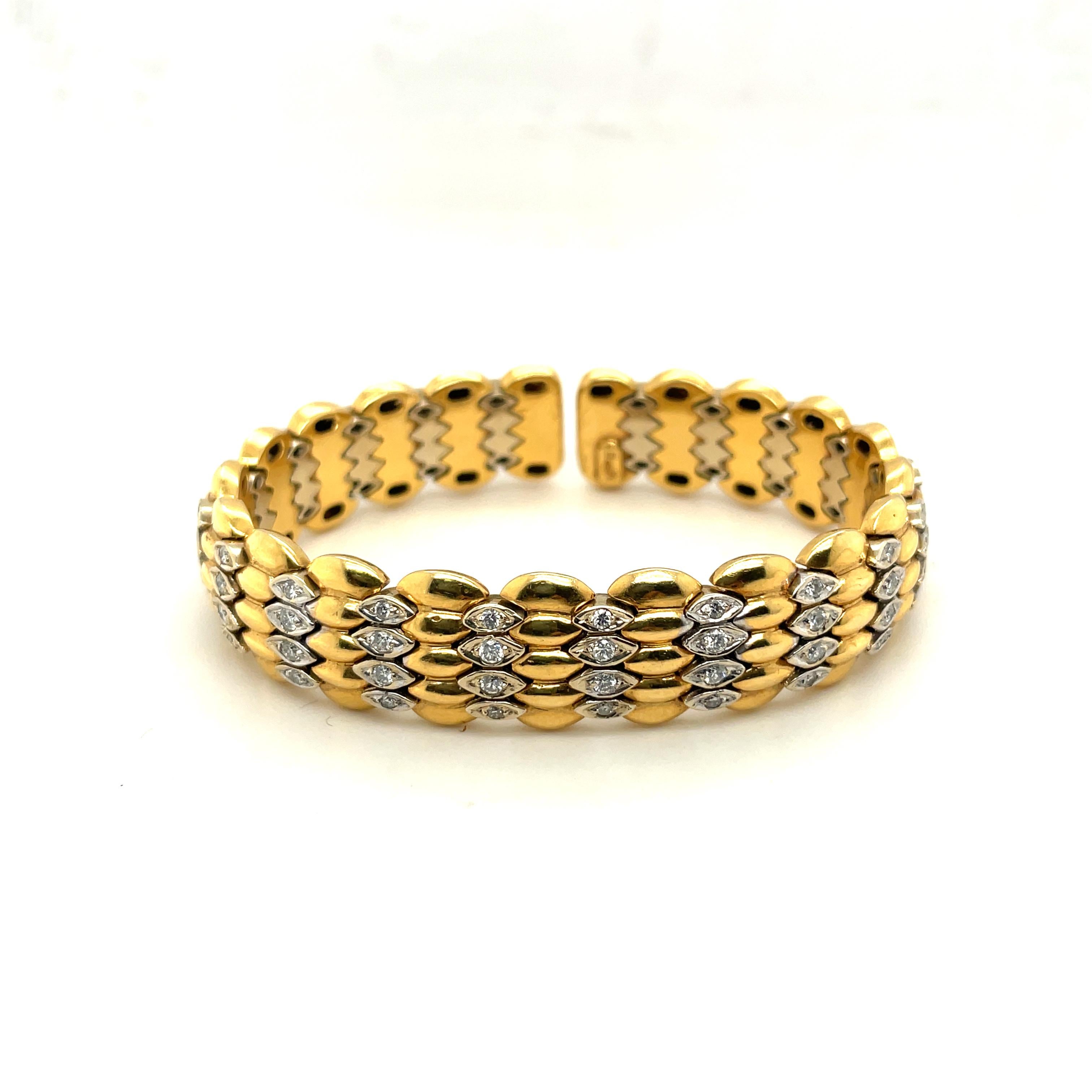 18K Yellow Gold Diamond Cuff Bangle Bracelet

 Interior cir. 6 3/8, wd. 9/16 in.

Weight 67.3 Grams