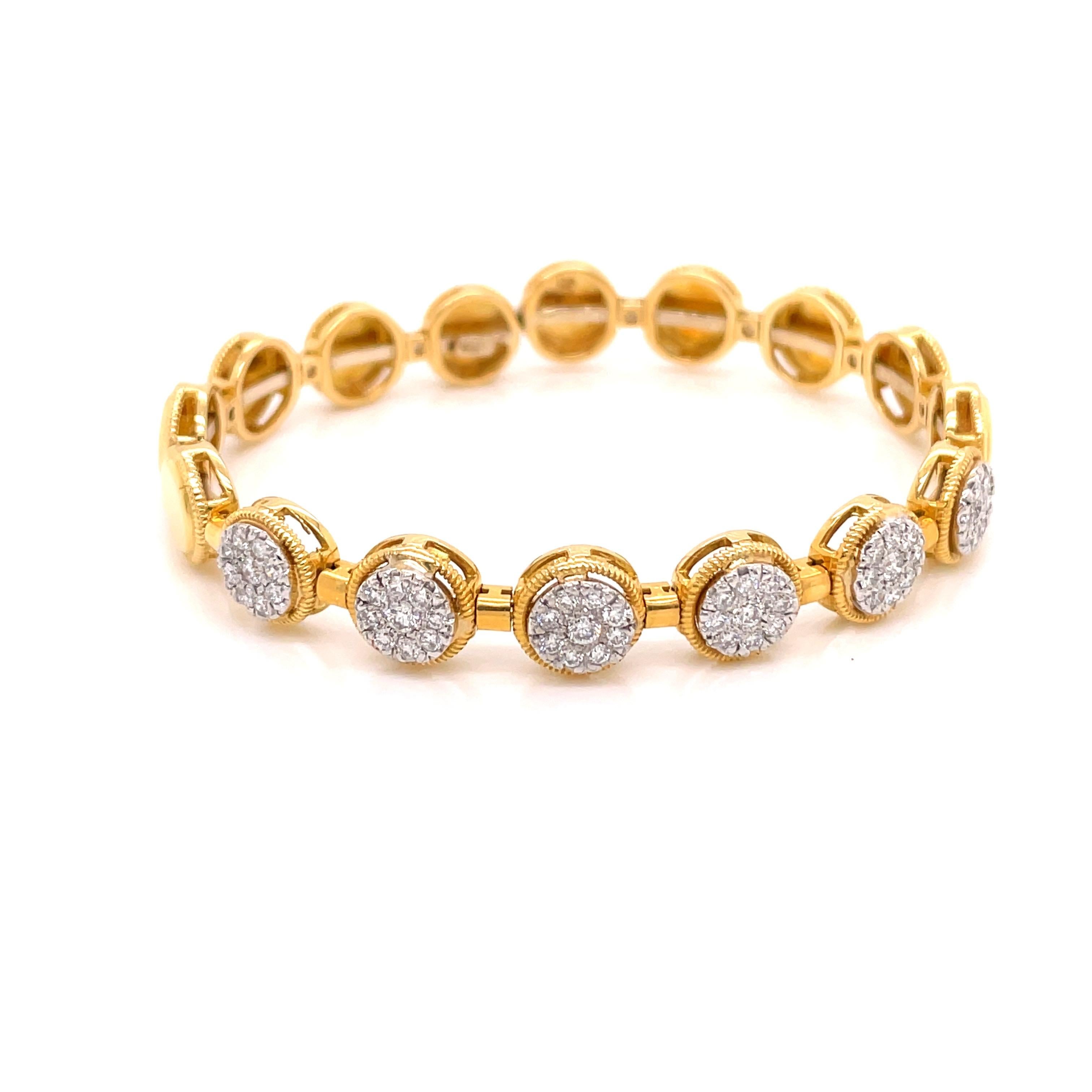 18K Yellow Gold Diamond Cuff Bracelet 1.00ct - The bangle has 6 sections of pave round brilliant diamonds - total of 54 diamonds weighing 1.00ct with F - G color and VS2 - SI1 clarity. The diamonds are set in white gold for a brighter sparkle. The