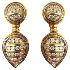 Boucles d'oreilles clips en or jaune 18K et diamants